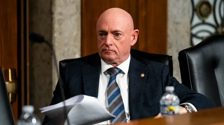 Mark Kelly backs Nancy Lacore after Hegseth fired her from the Navy Reserve