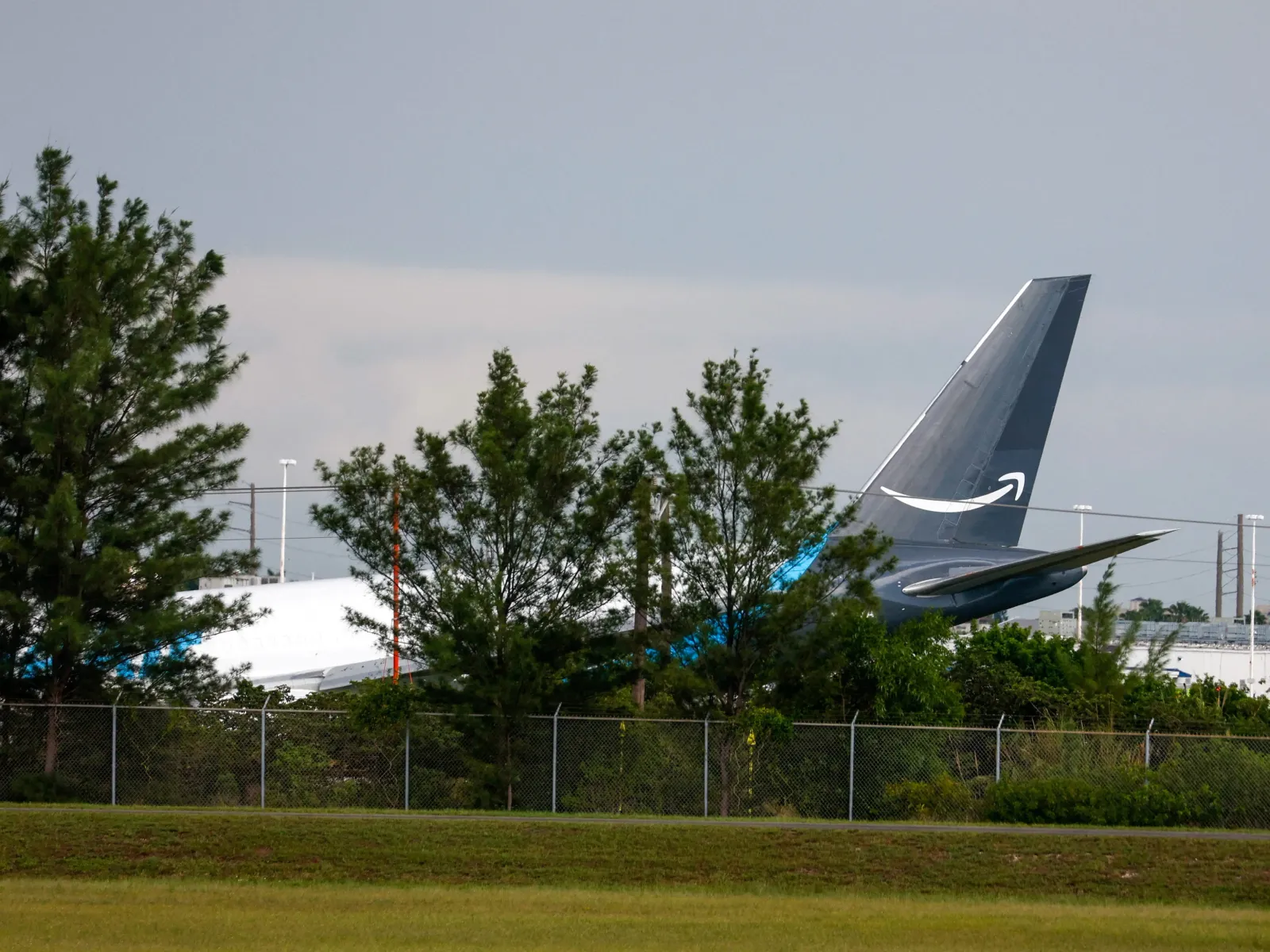 Amazon Prime Air 767 overshoots Miami runway, strikes vehicles, catches fire