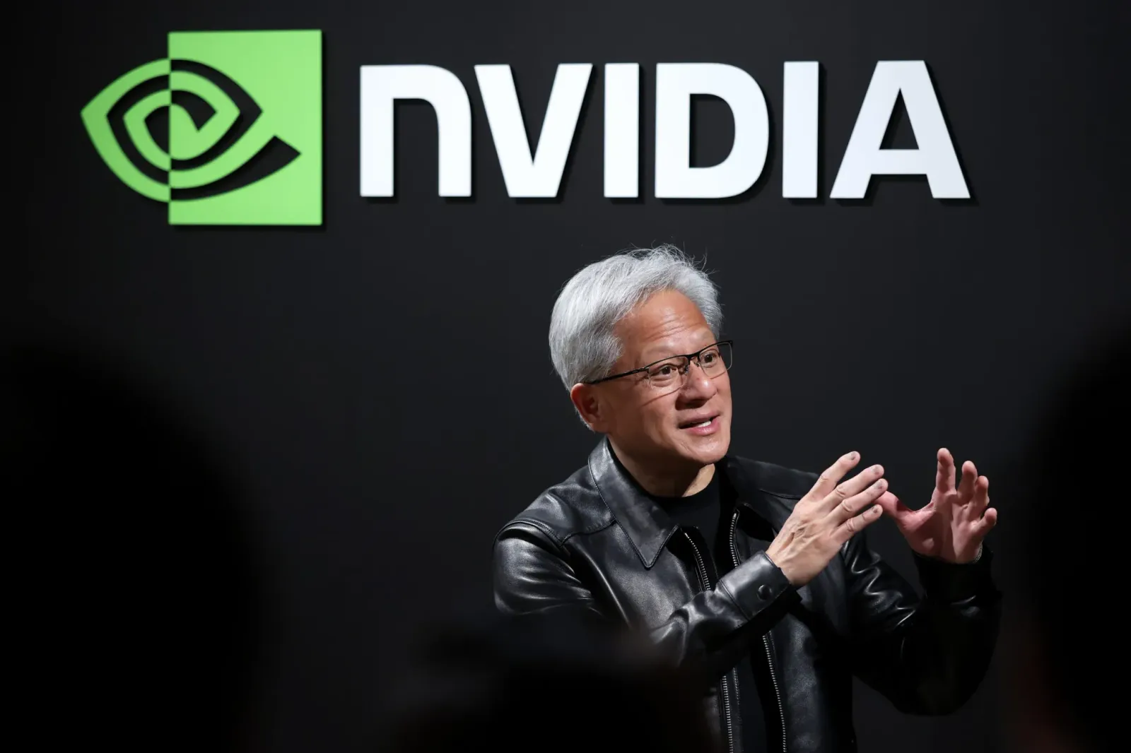 Jensen Huang denies AI chip bust, says “this time is different” in Axios interview