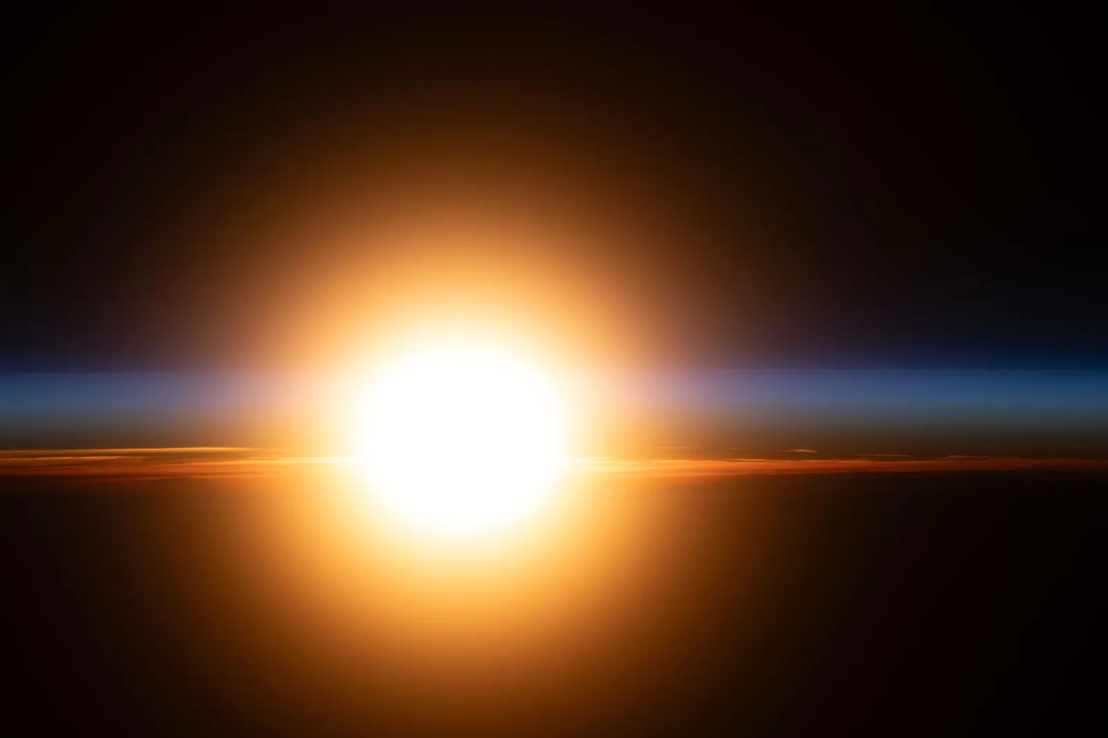 Chris Williams captures Earth’s orange sunrise as ISS loops 16 times in 24 hours