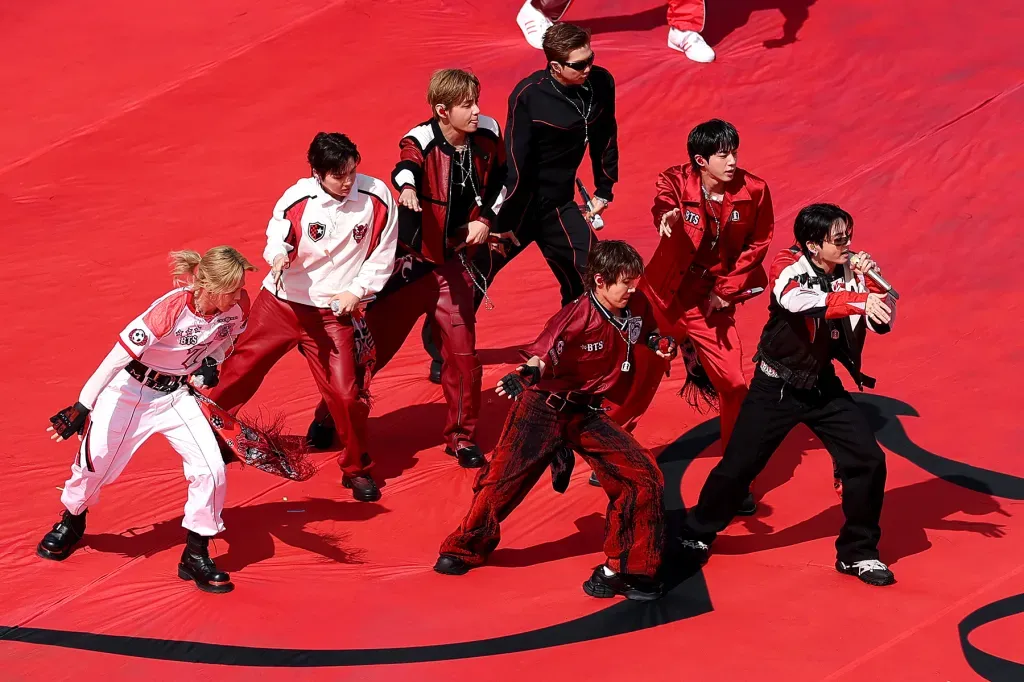BTS lights up World Cup final halftime with “Dynamite,” after Coldplay’s “We Dance” bid