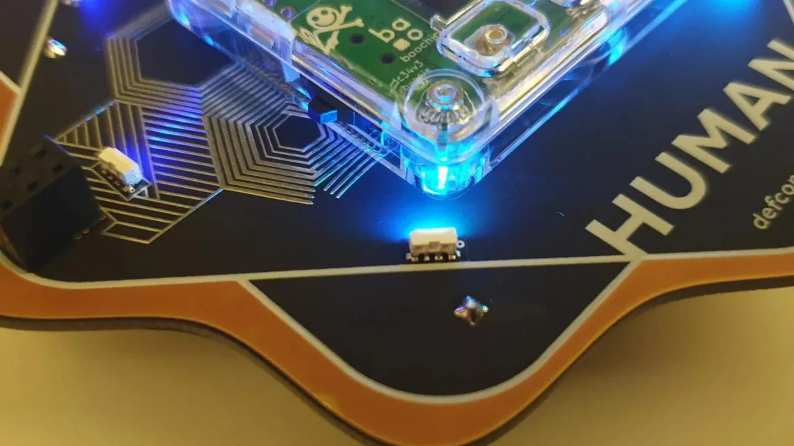 Defcon badge creator bunnie Huang embeds an inspectable security key chip