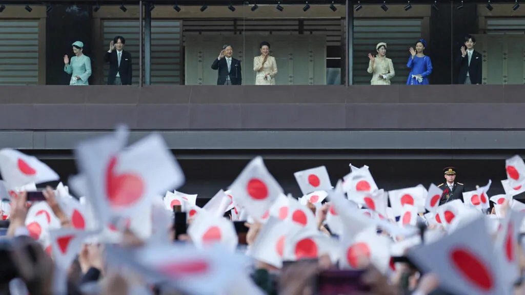 Japan passes succession changes, but keeps ban on female emperors