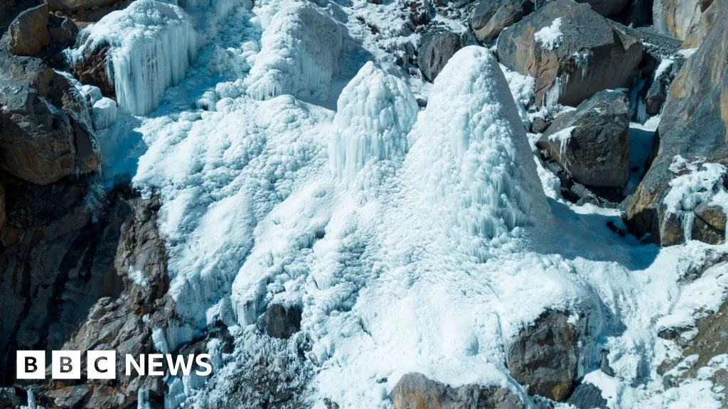 Villagers build artificial ice pyramids to secure spring water for crops