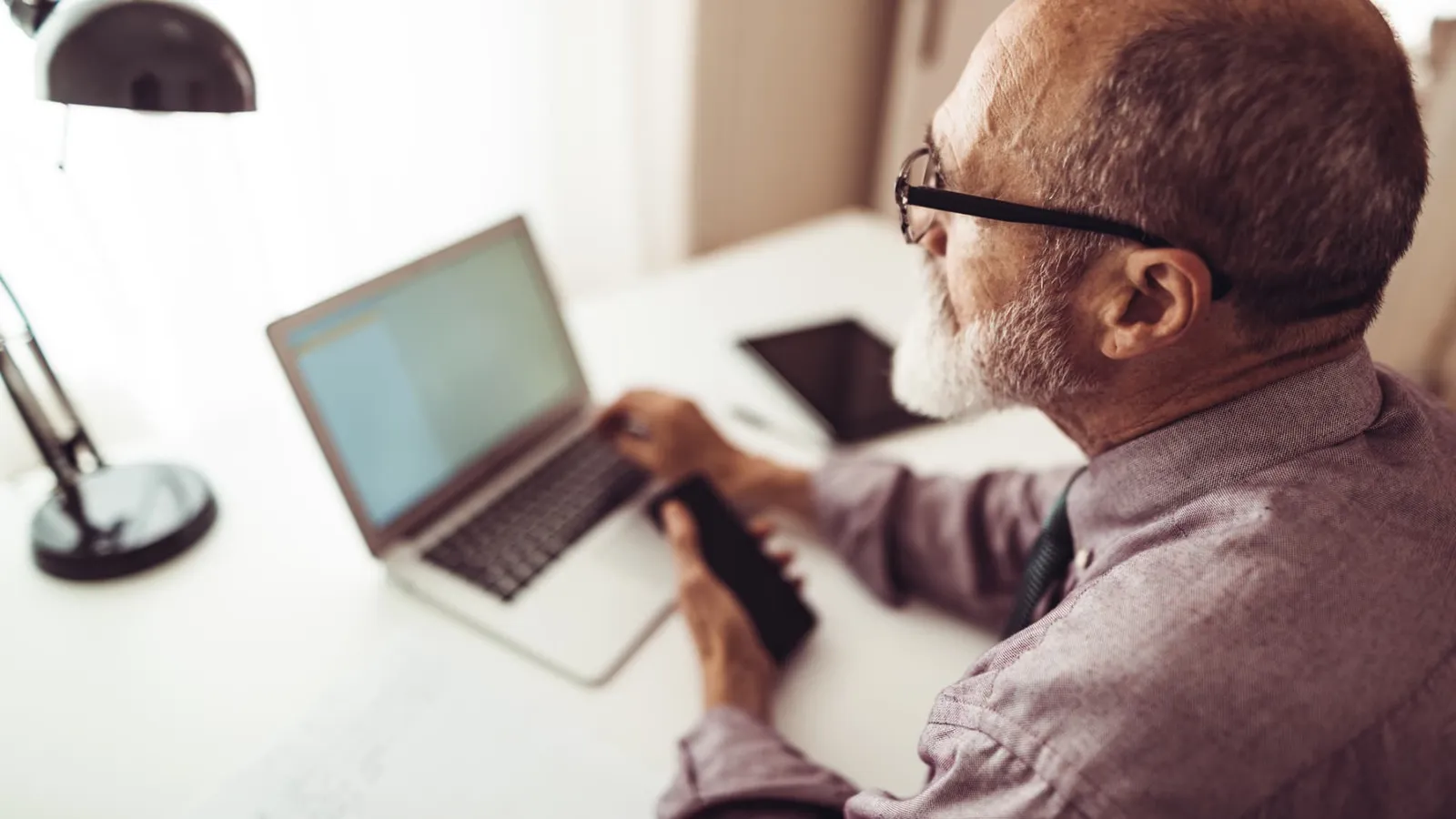 AI is reshaping older workers' careers, research finds: exit risk or efficiency boost