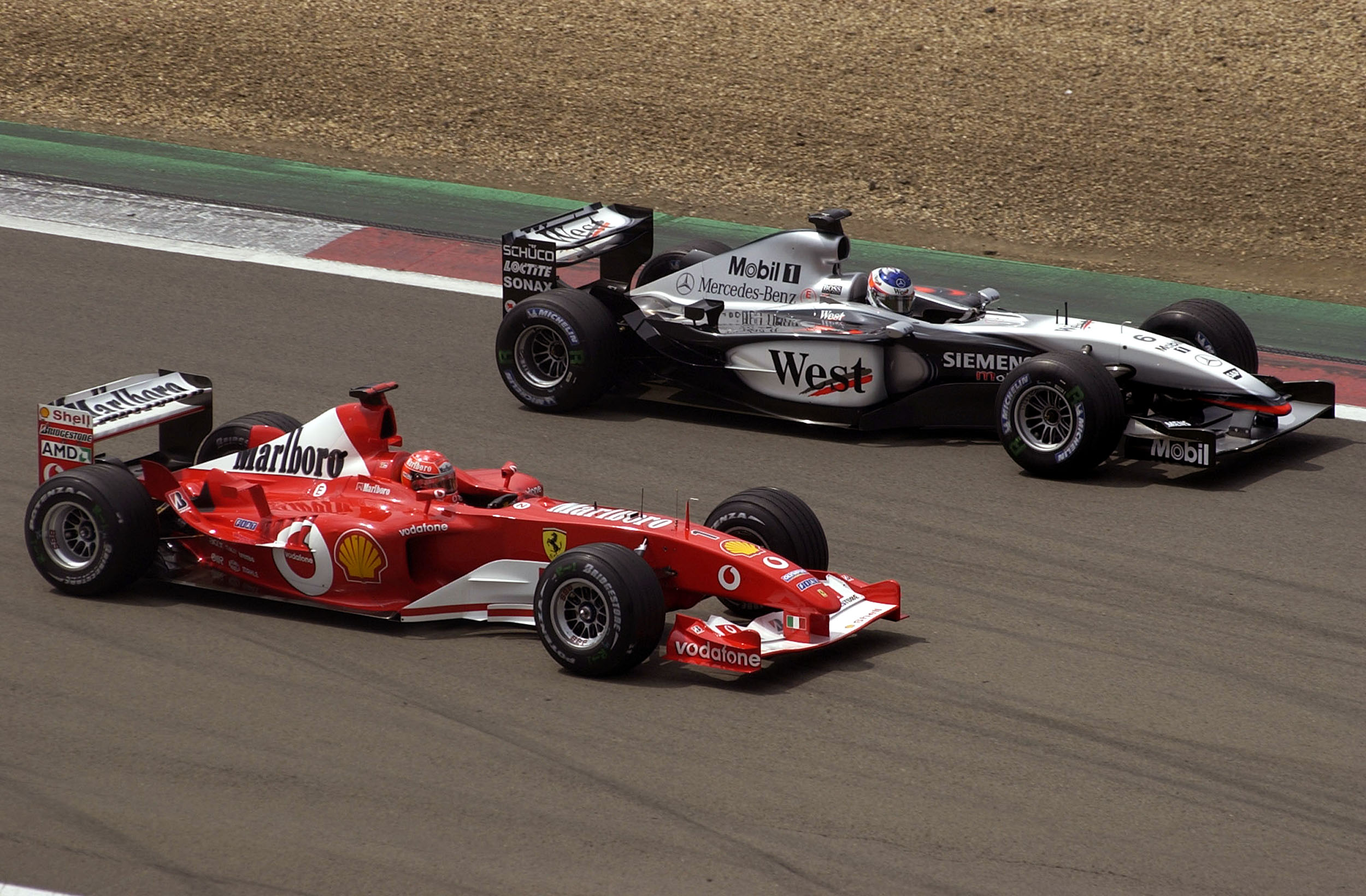 Ferrari, McLaren 2003