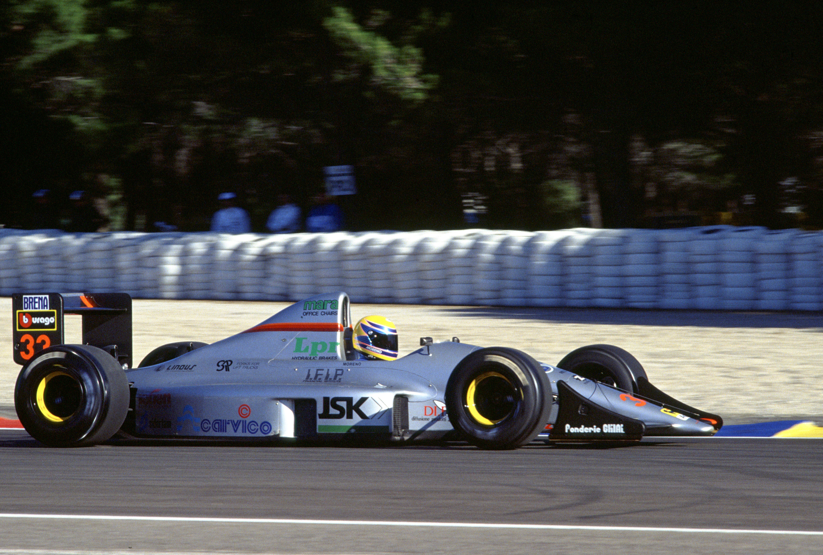 Ayrton Senna puts on his helmet, Spanish GP 1990 print by Motorsport Images