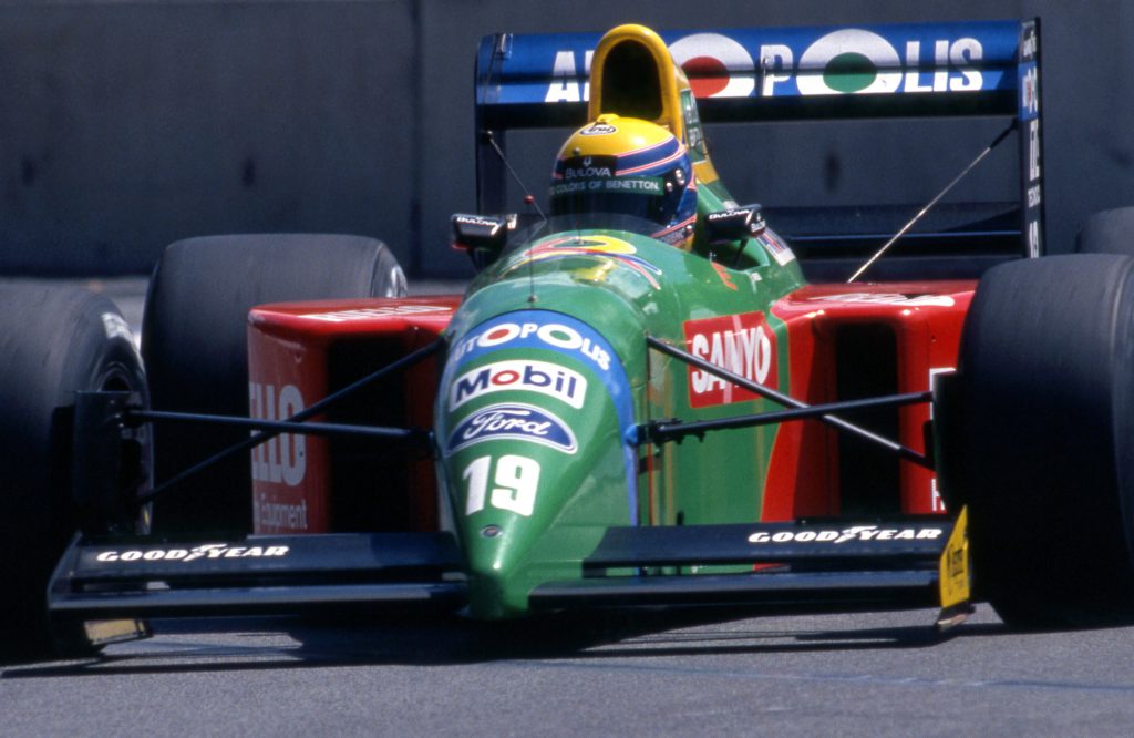 Ayrton Senna puts on his helmet, Spanish GP 1990 print by Motorsport Images