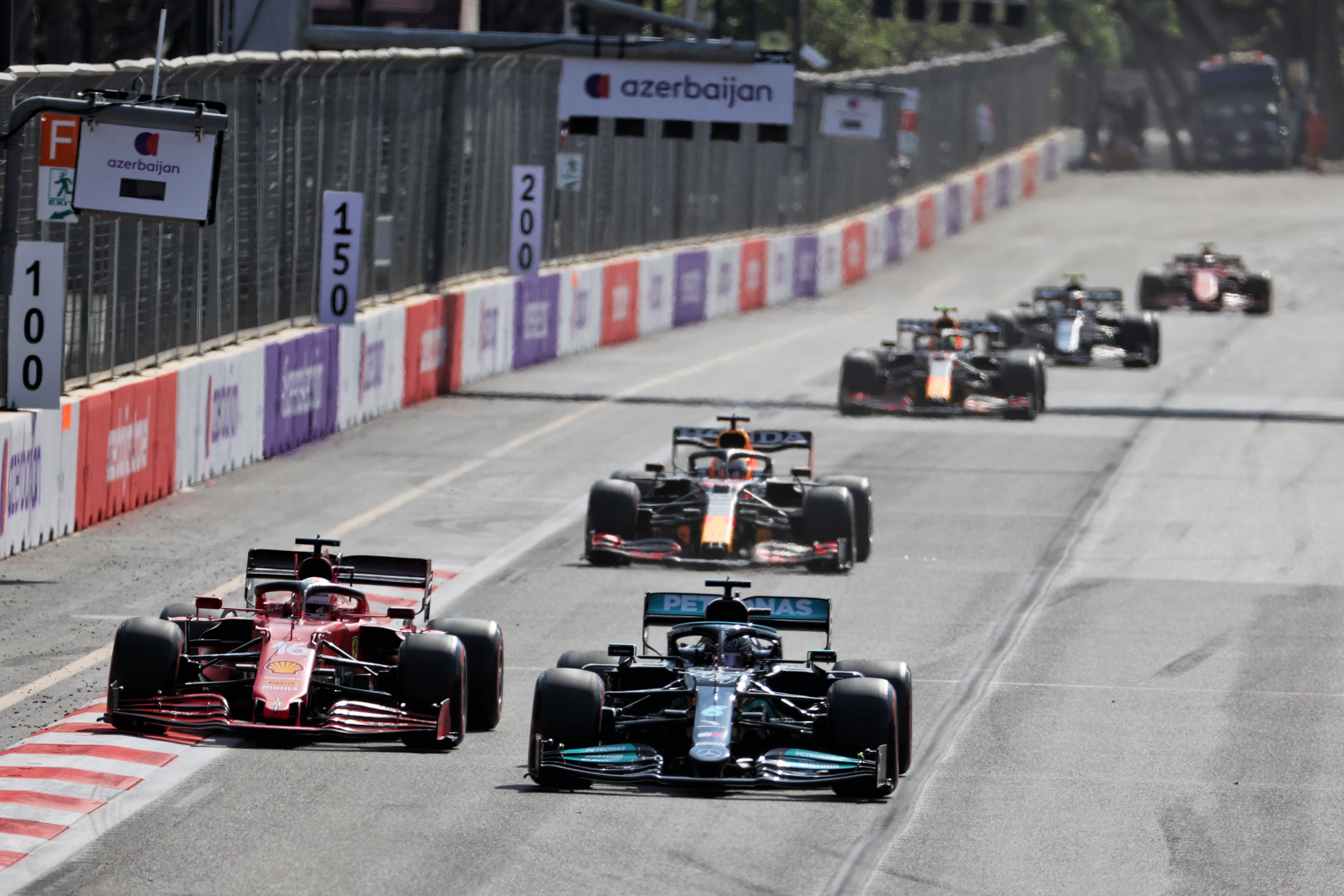 Lewis Hamilton passes Charles Leclerc Baku F1 2021