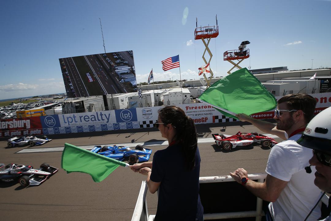 Bronze Medalists Brittany Bowe And Joey Mantia Wave The Green Flag To Start The Race Firestone Grand Prix Of St Petersburg By Chris Jones Referenceimagewithoutwatermark M52277