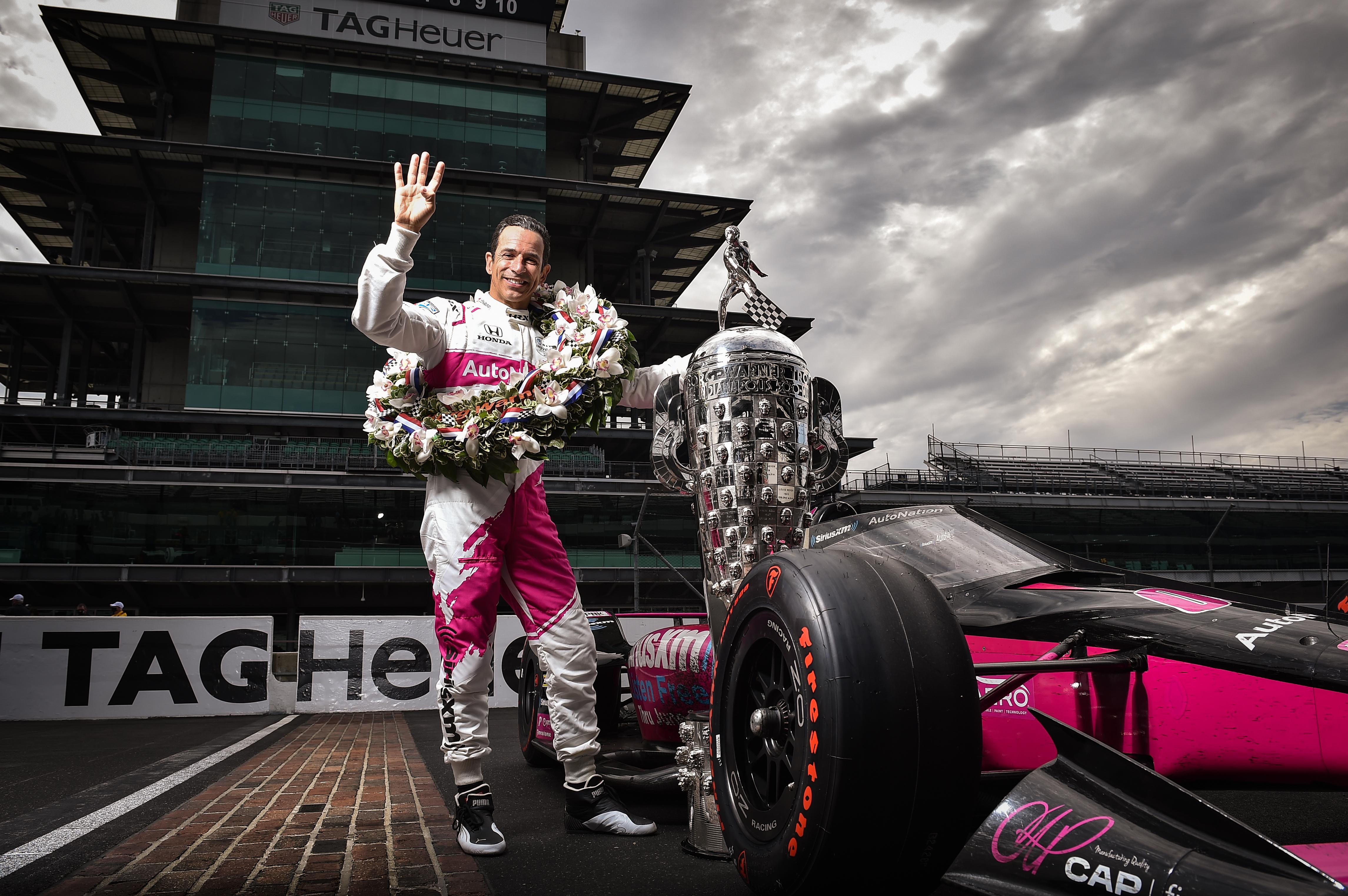 Helio Castroneves Holds Up Four Fingers The Morning After Winning His Fourth Indianapolis 500 Largeimagewithoutwatermark M50389