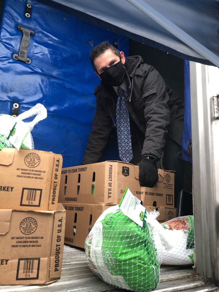 LifeSpire man unloading Turkeys from Truck