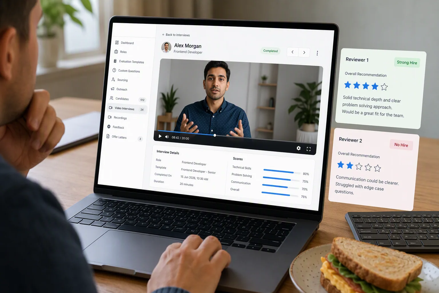 Recruiting manager comparing video interview evidence