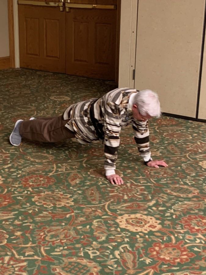 Senior resident shows off her planking skills