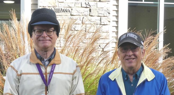 men posing for picture at The Glebe event