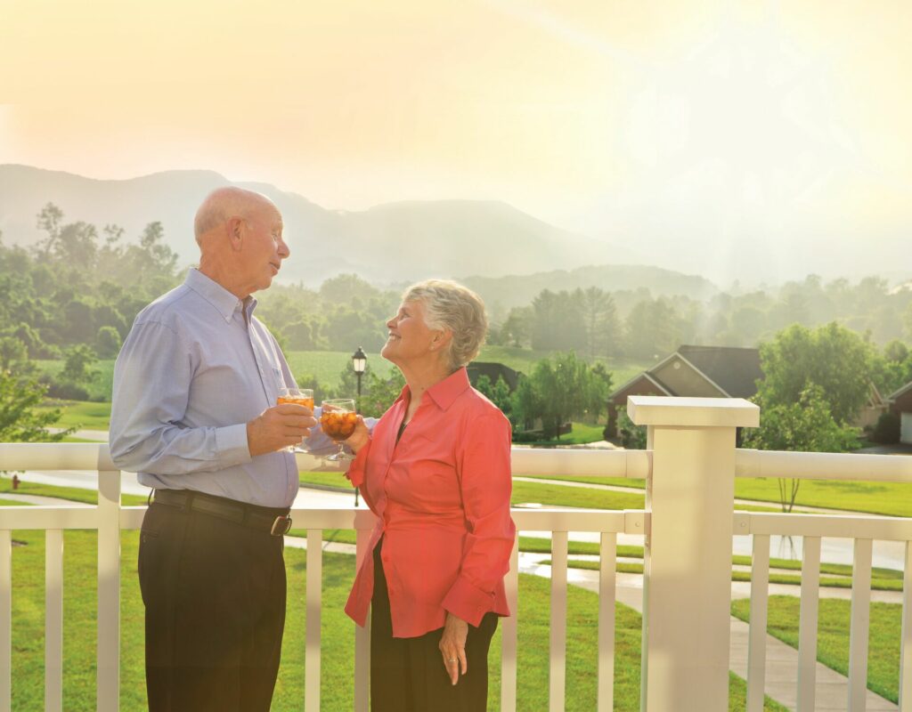 Senior couple having a drink on their porch