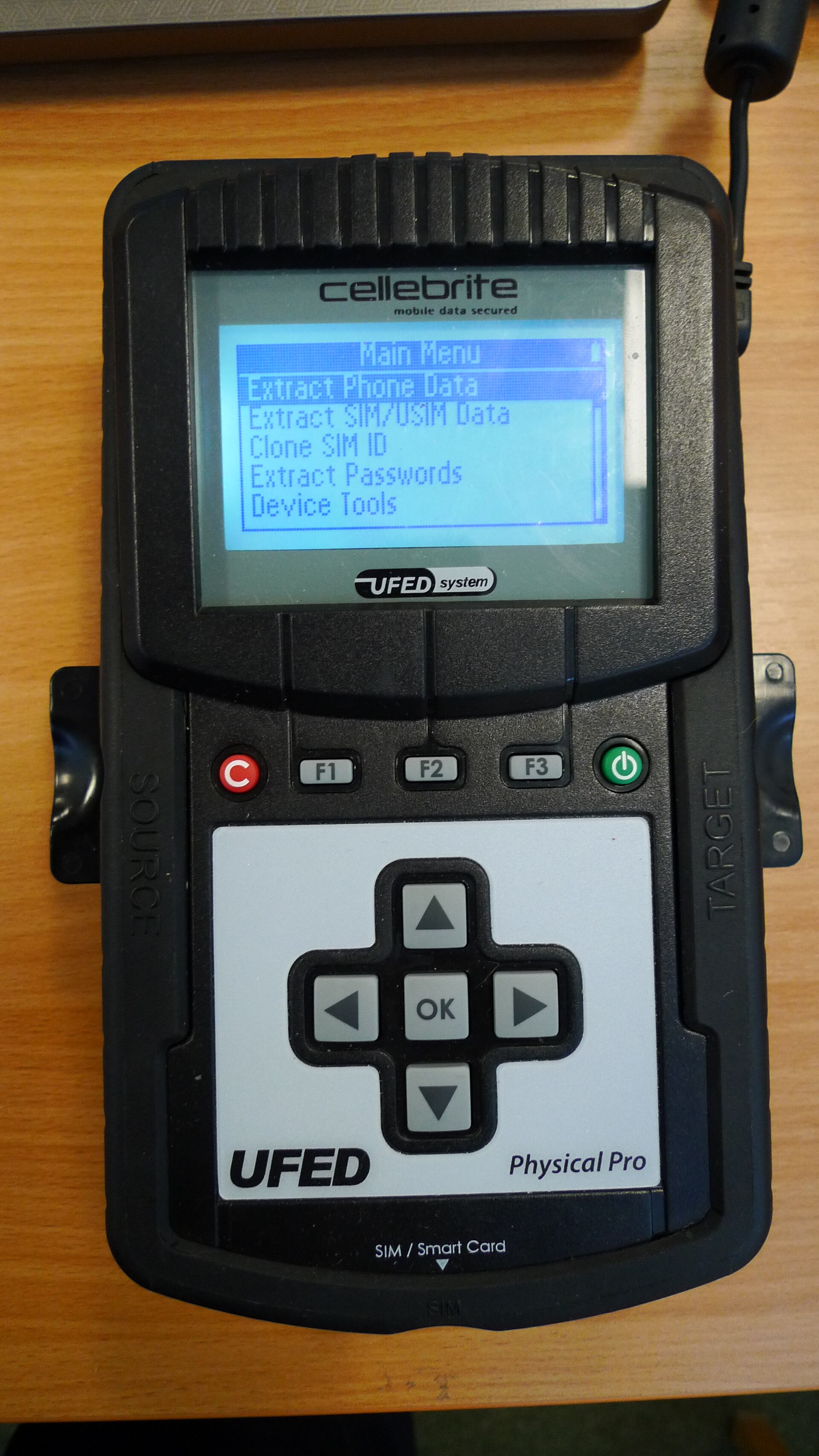 A Cellebrite UFED Physical Pro handheld extraction device