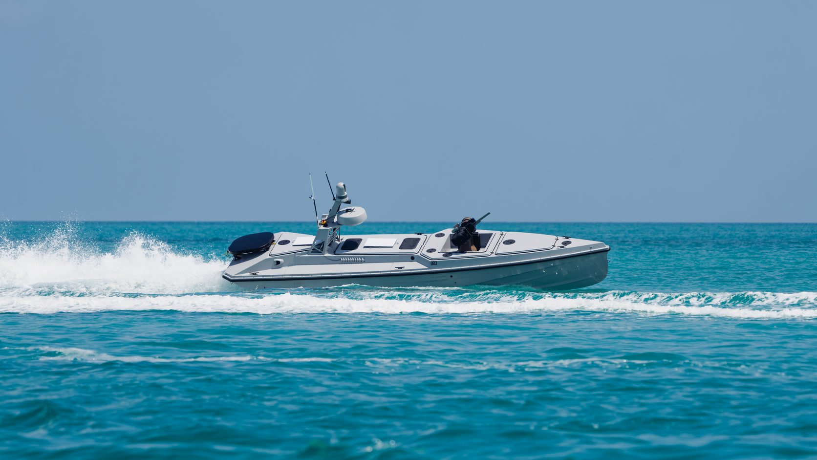 Red Cat's Blue Ops Variant 7 uncrewed surface vessel running at speed on open water.