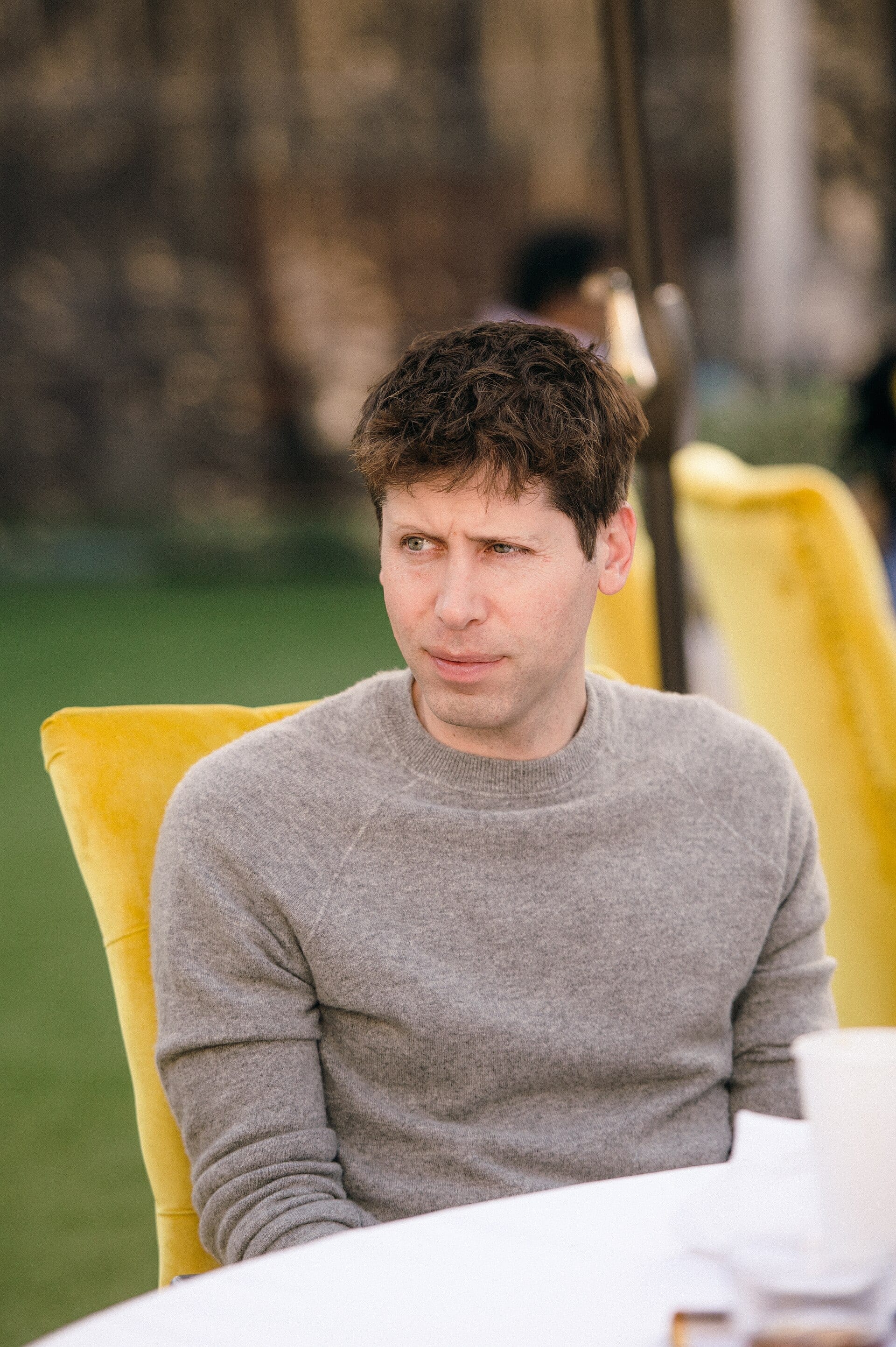 Sam Altman, OpenAI's chief executive, seated at an event