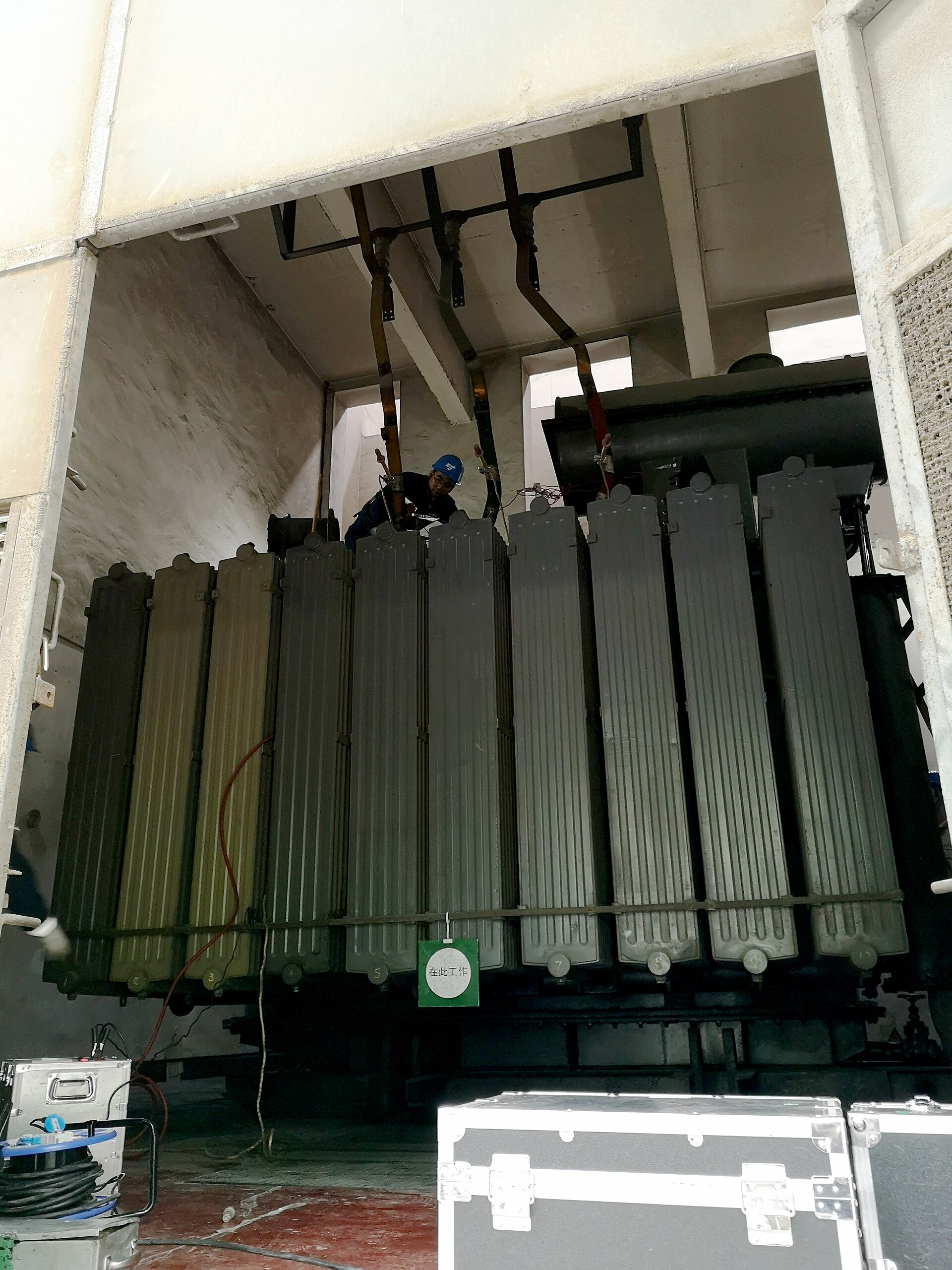 A large outdoor substation transformer with radiator fins and high-voltage bushings, the kind of equipment Ohio regulators ordered FirstEnergy to install by the end of 2026