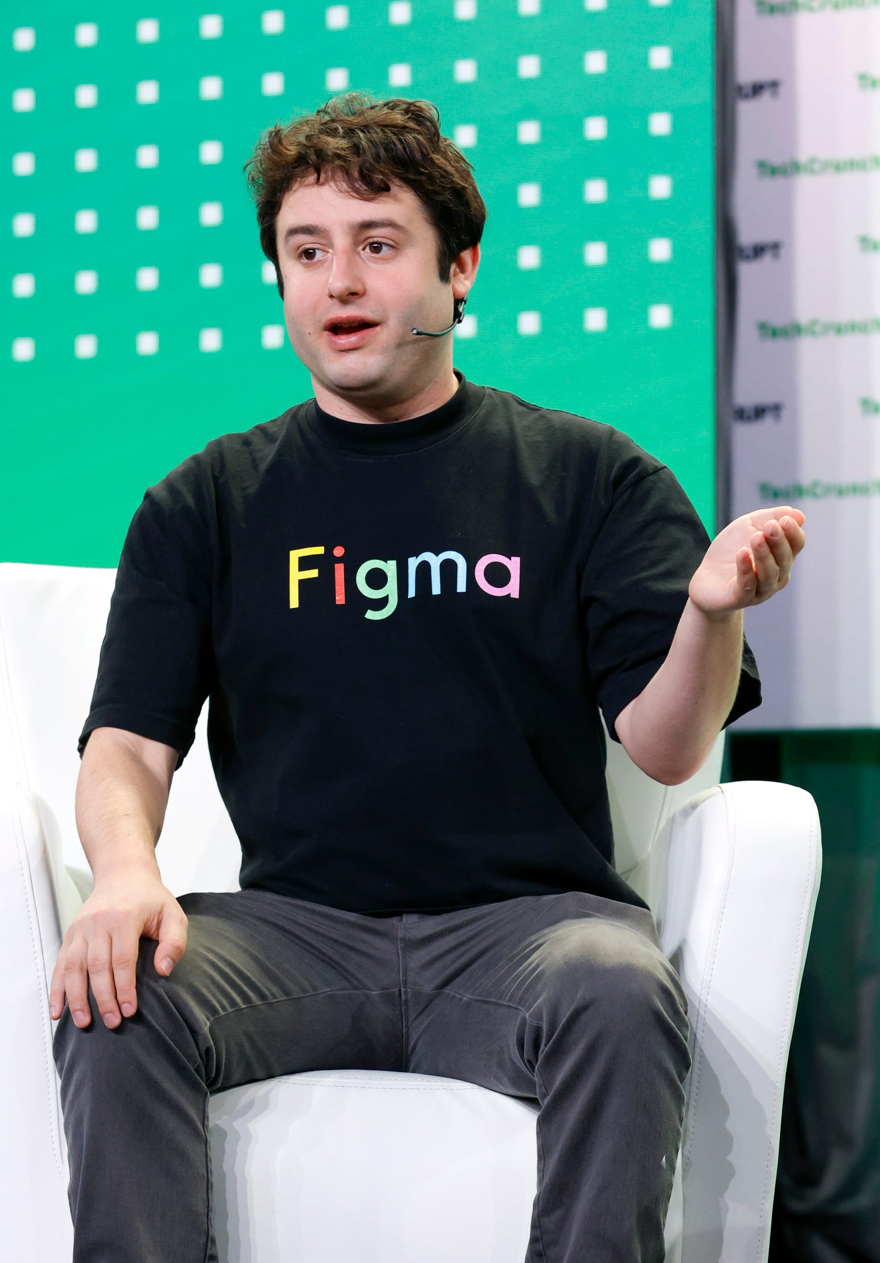 Dylan Field, Figma's founder and chief executive, speaking on stage at TechCrunch Disrupt 2022
