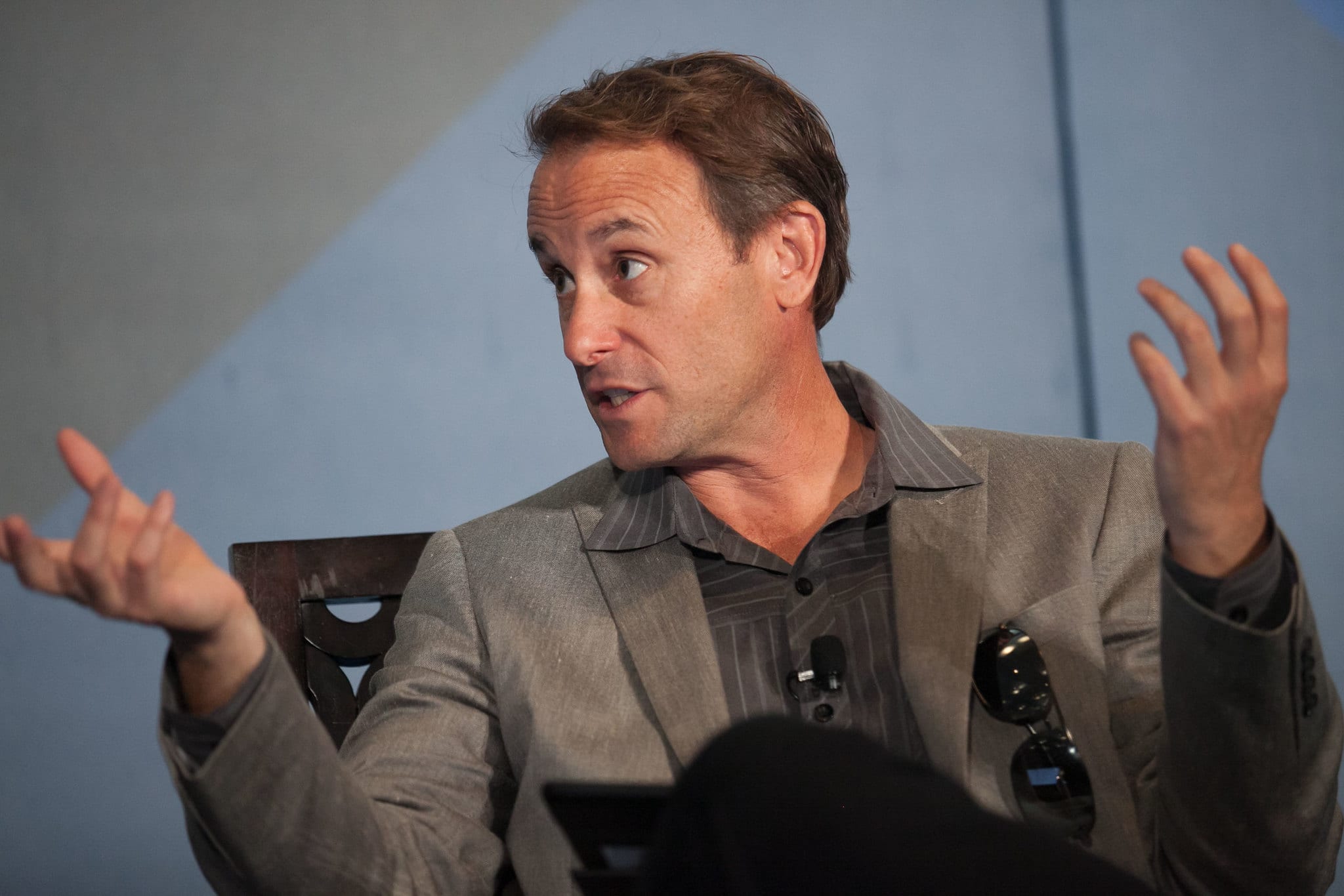 Jason Lemkin, founder of SaaStr, gesturing while speaking on a panel