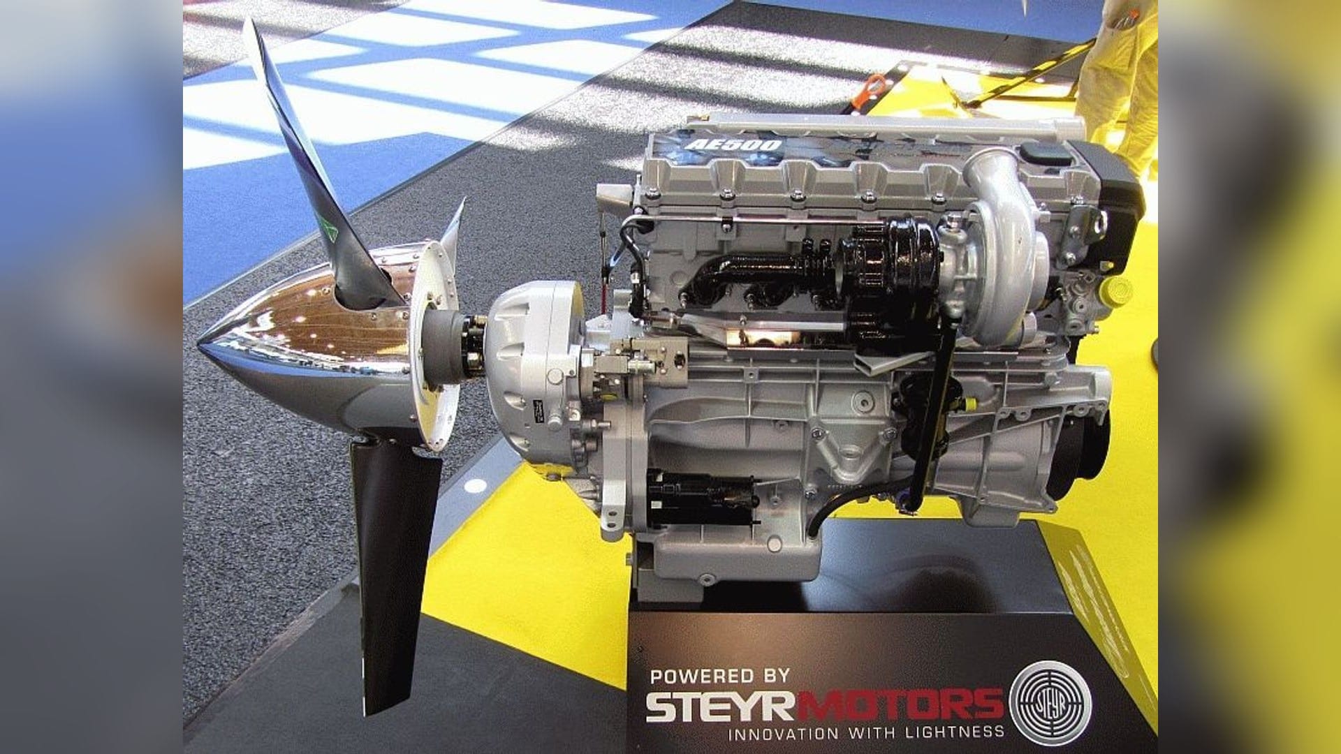 An aircraft engine built on a Steyr Motors base, marked Powered by Steyr Motors