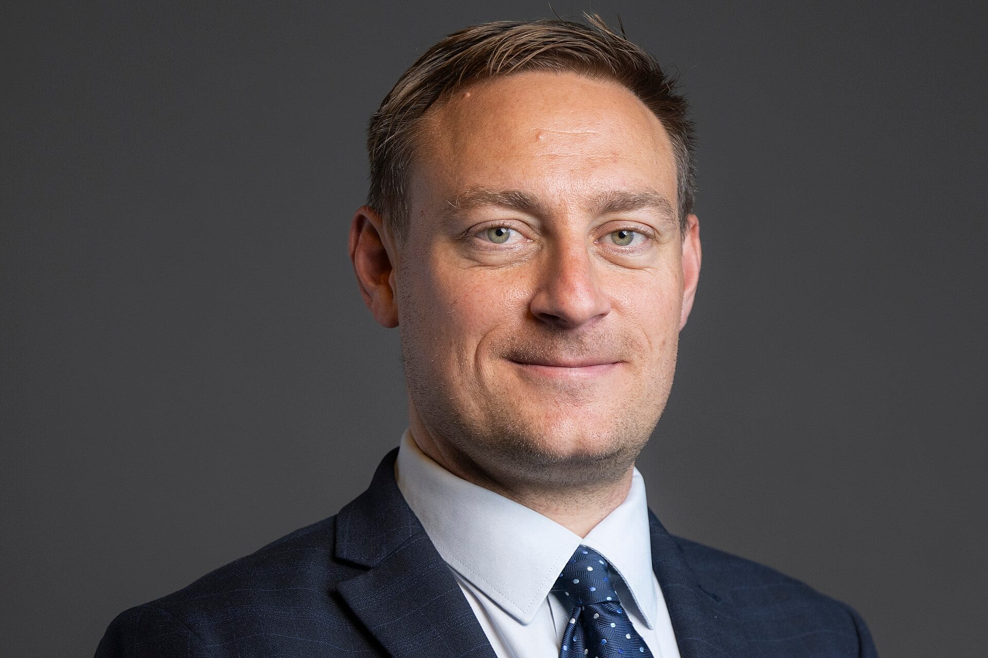 Official portrait of Olly Glover MP