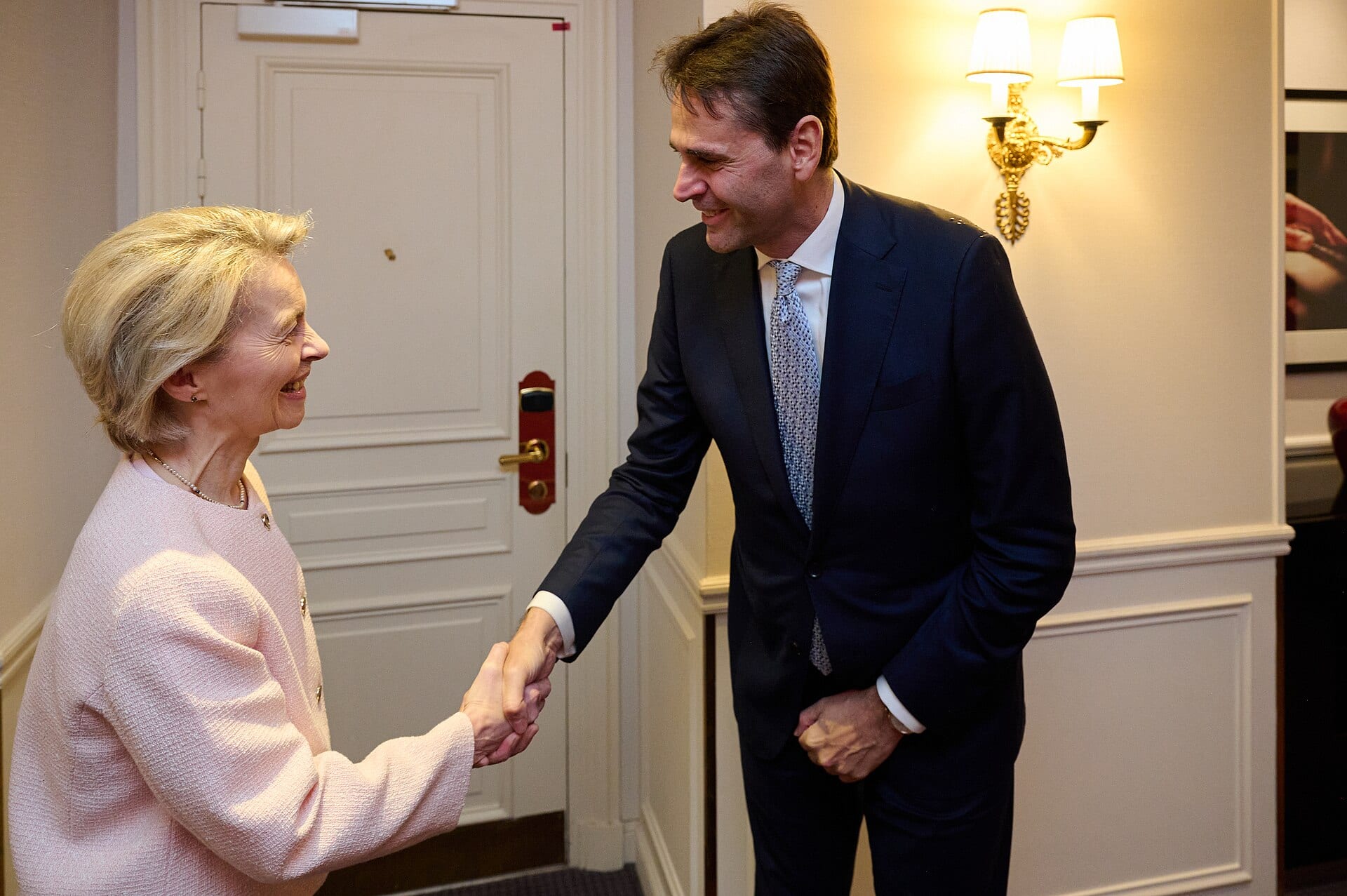 ASML chief executive Christophe Fouquet shaking hands with European Commission president Ursula von der Leyen