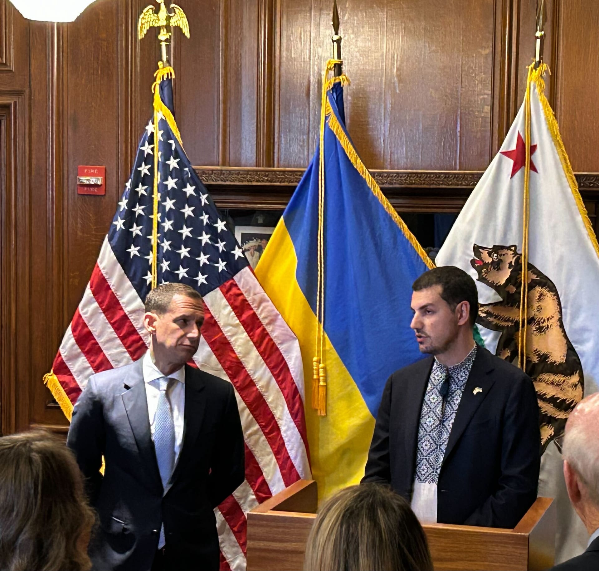 San Francisco Mayor Daniel Lurie listening during a ceremony at City Hall in 2025.