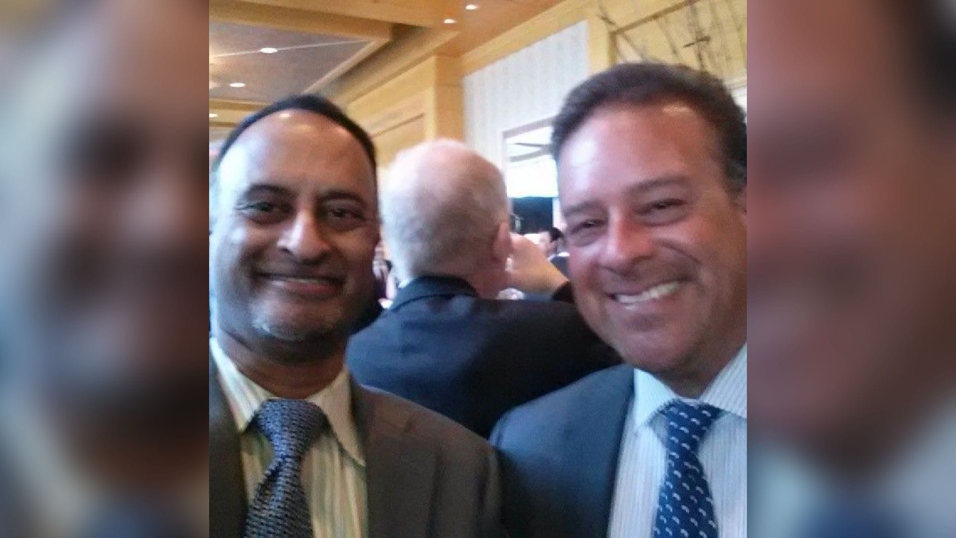 Raul Fernandez, chairman and chief executive of DXC Technology, right, at a technology event
