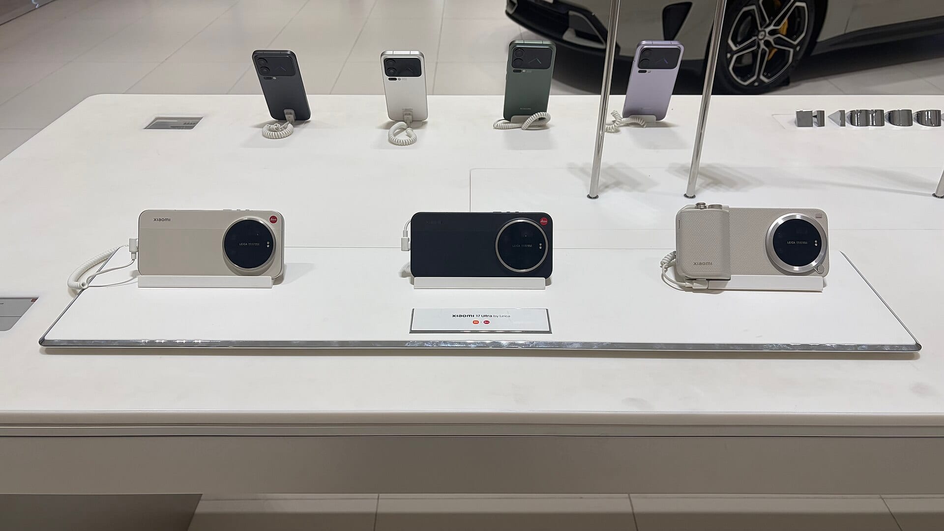 Xiaomi 17 Ultra by Leica phones on a retail display stand