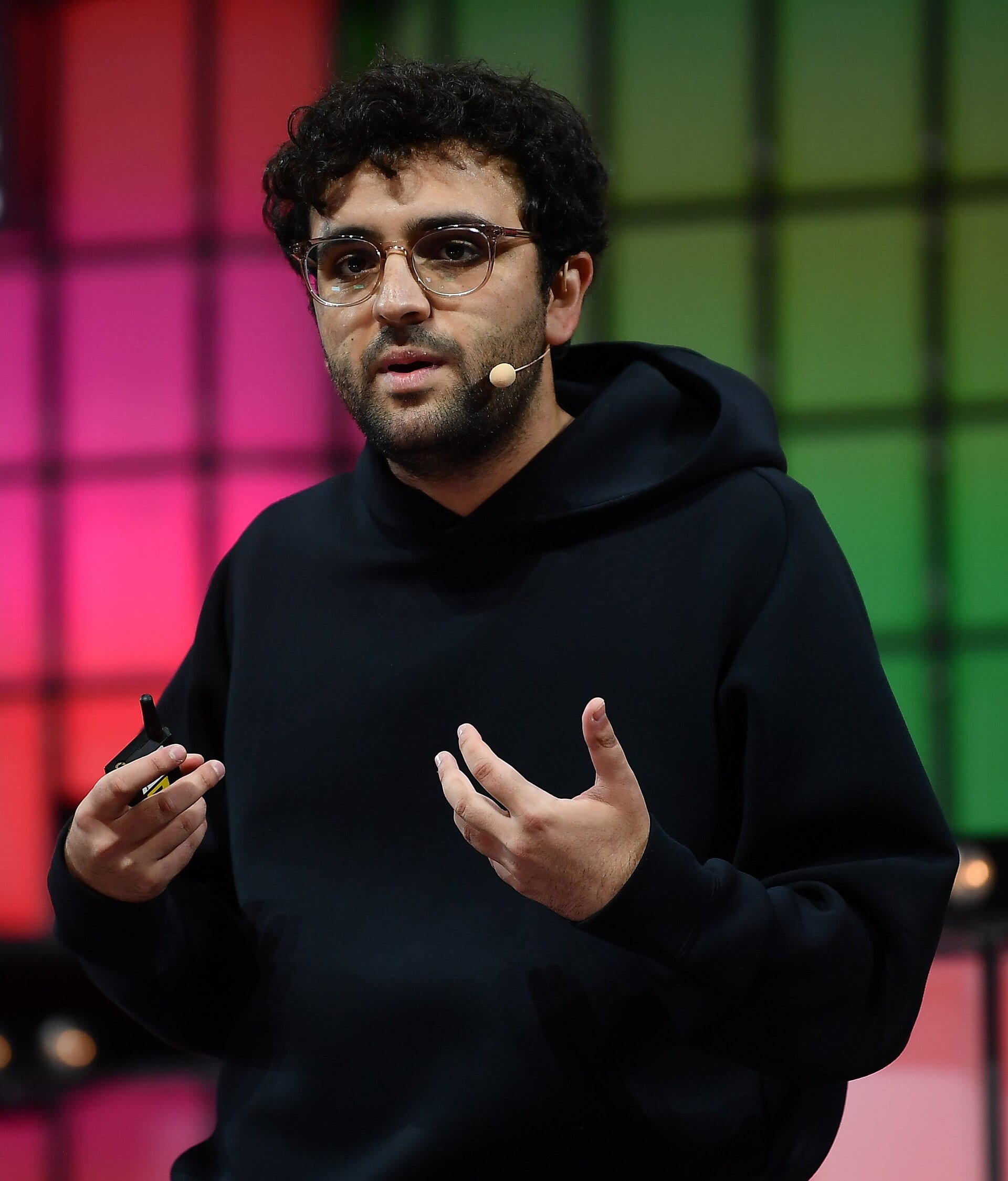 Kalshi chief executive Tarek Mansour speaking on stage at Web Summit 2021 in Lisbon.