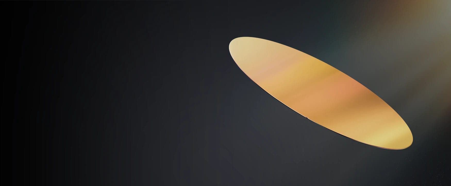 A polished 200mm silicon carbide wafer against a dark background