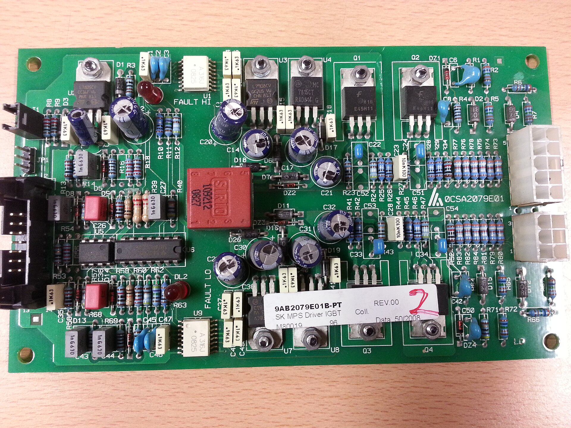 Close-up of a populated green printed circuit board