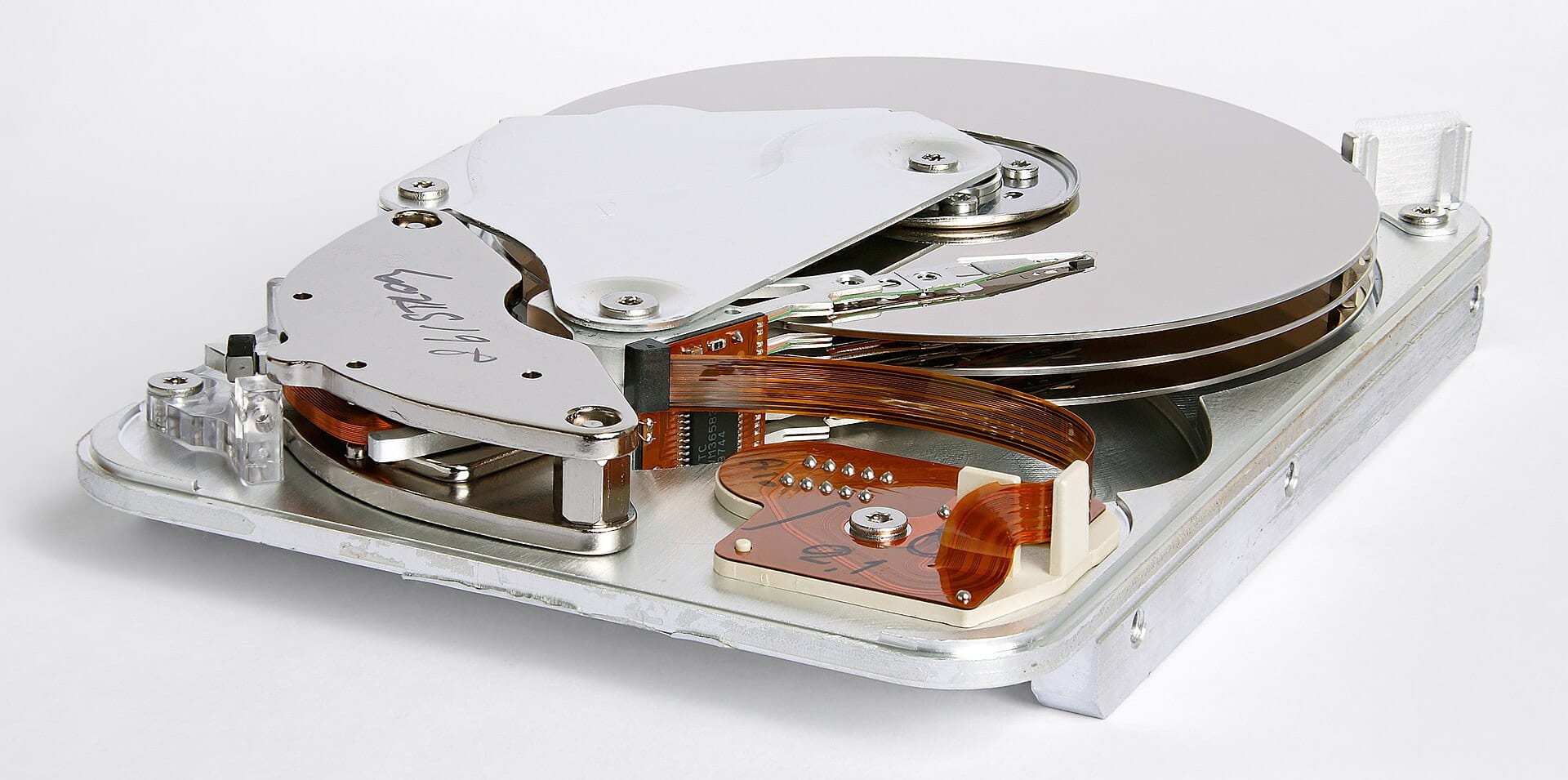 An opened Seagate hard disk drive showing its polished platters and read-write head assembly