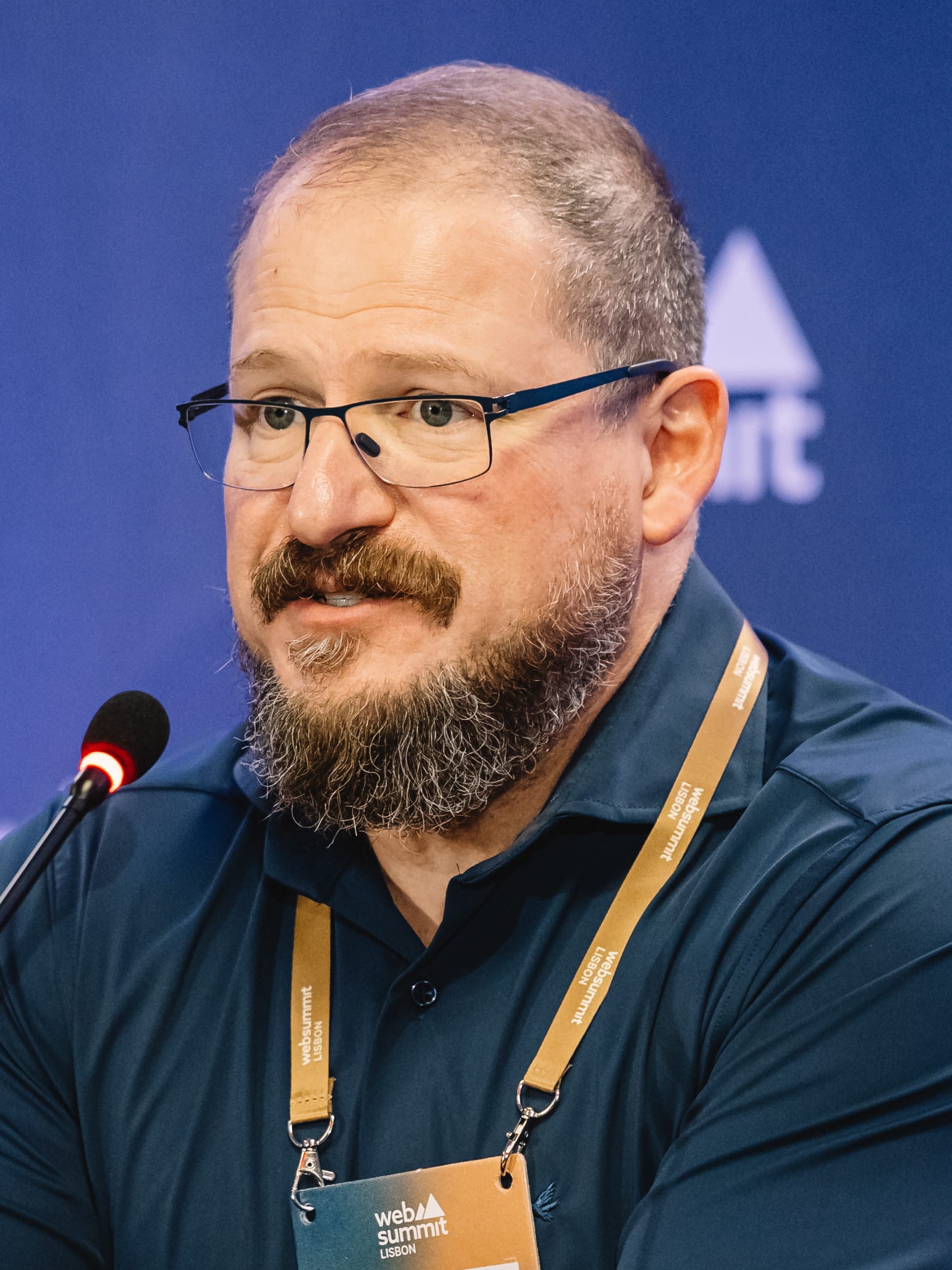 Cristiano Amon, chief executive of Qualcomm, speaking at Web Summit in Lisbon in 2024