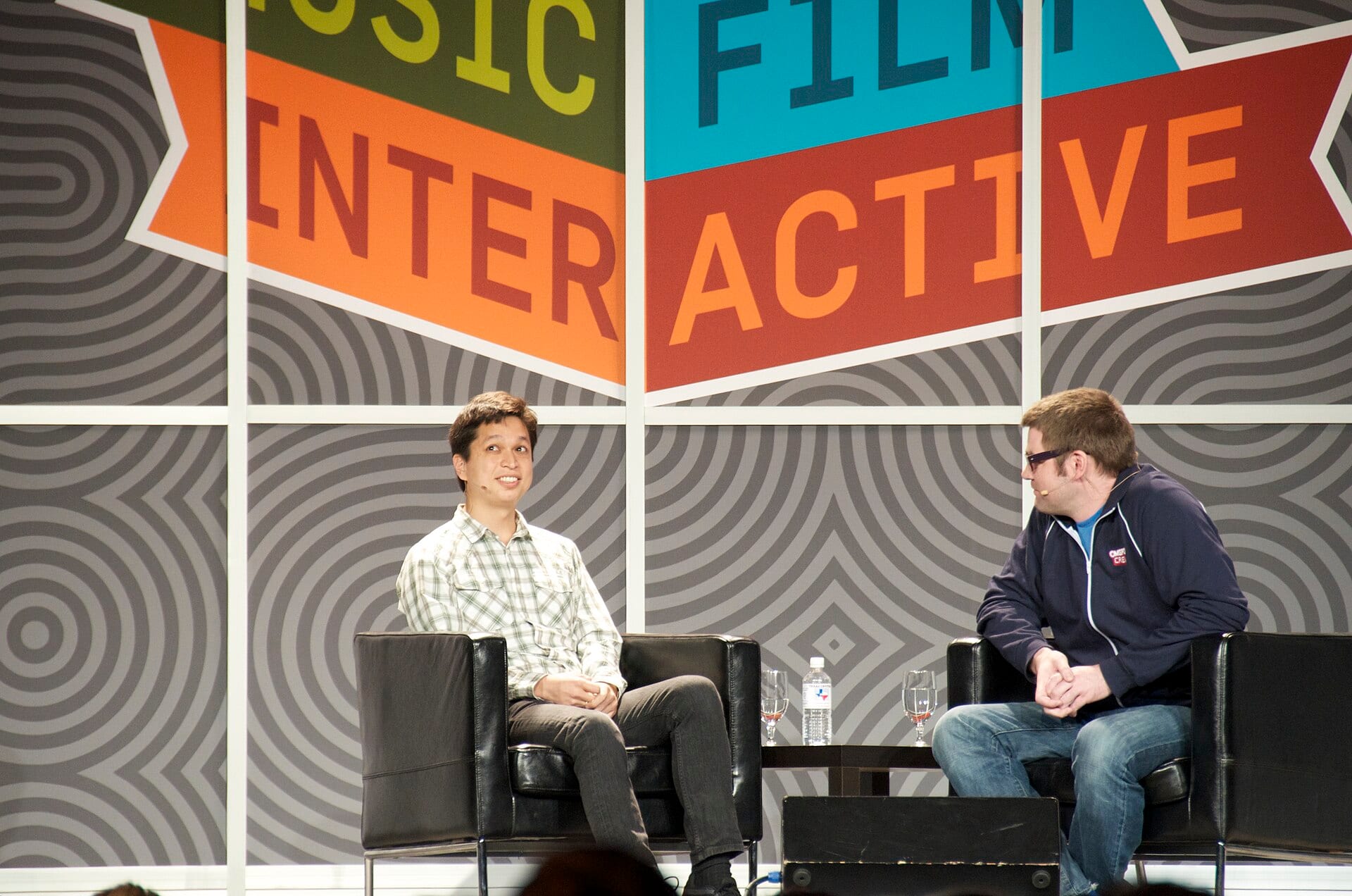 Pinterest co-founder Ben Silbermann smiling during a panel at SXSW Interactive, facing the camera