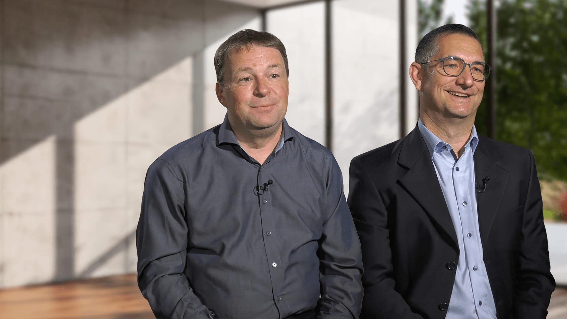 Two life-sciences executives from a Veeva customer story, interviewed on Veeva's customer stories page as pharma migrates to Vault CRM