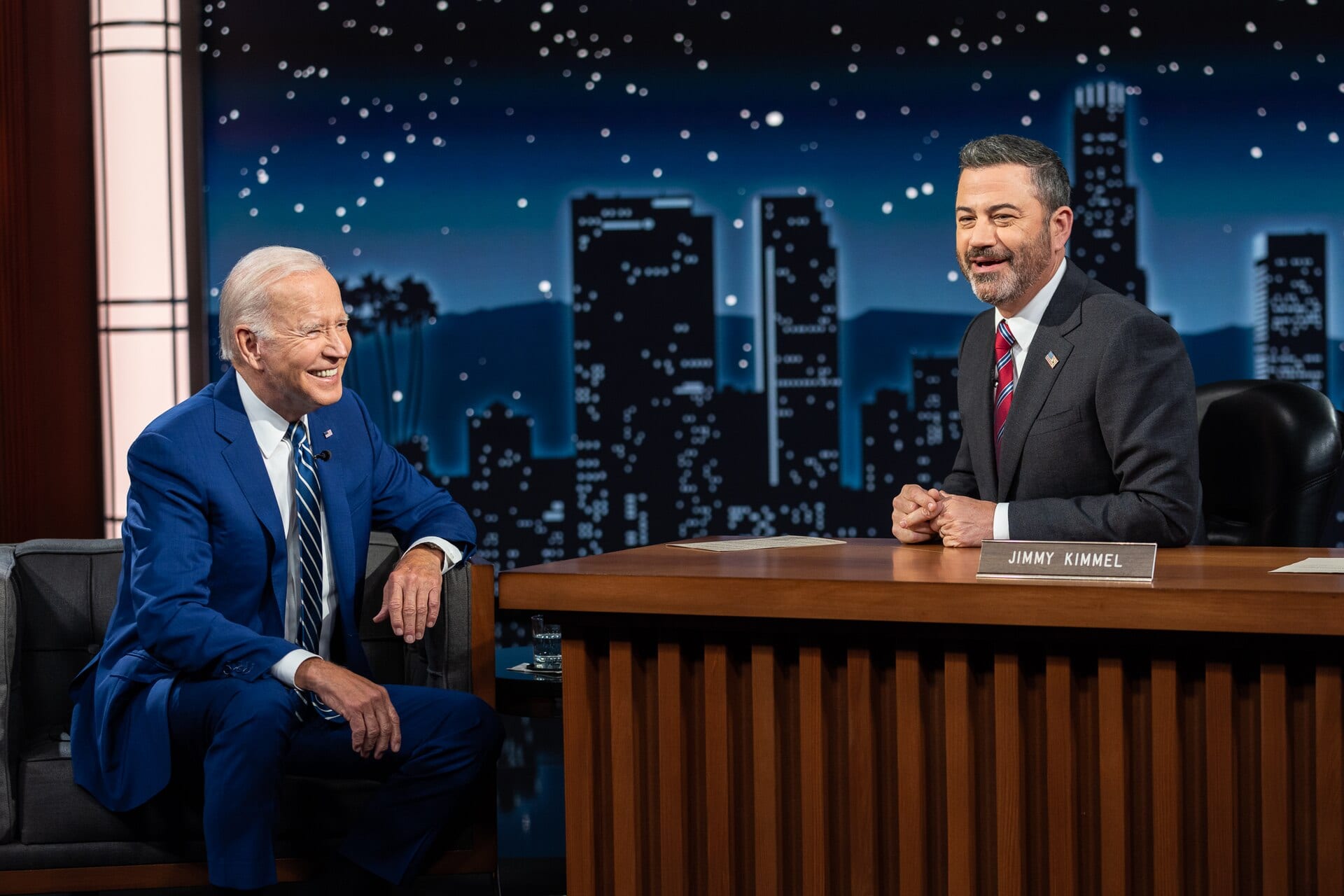 Jimmy Kimmel, right, at his desk on the set of Jimmy Kimmel Live! during a taping with President Joe Biden in Los Angeles in June 2022