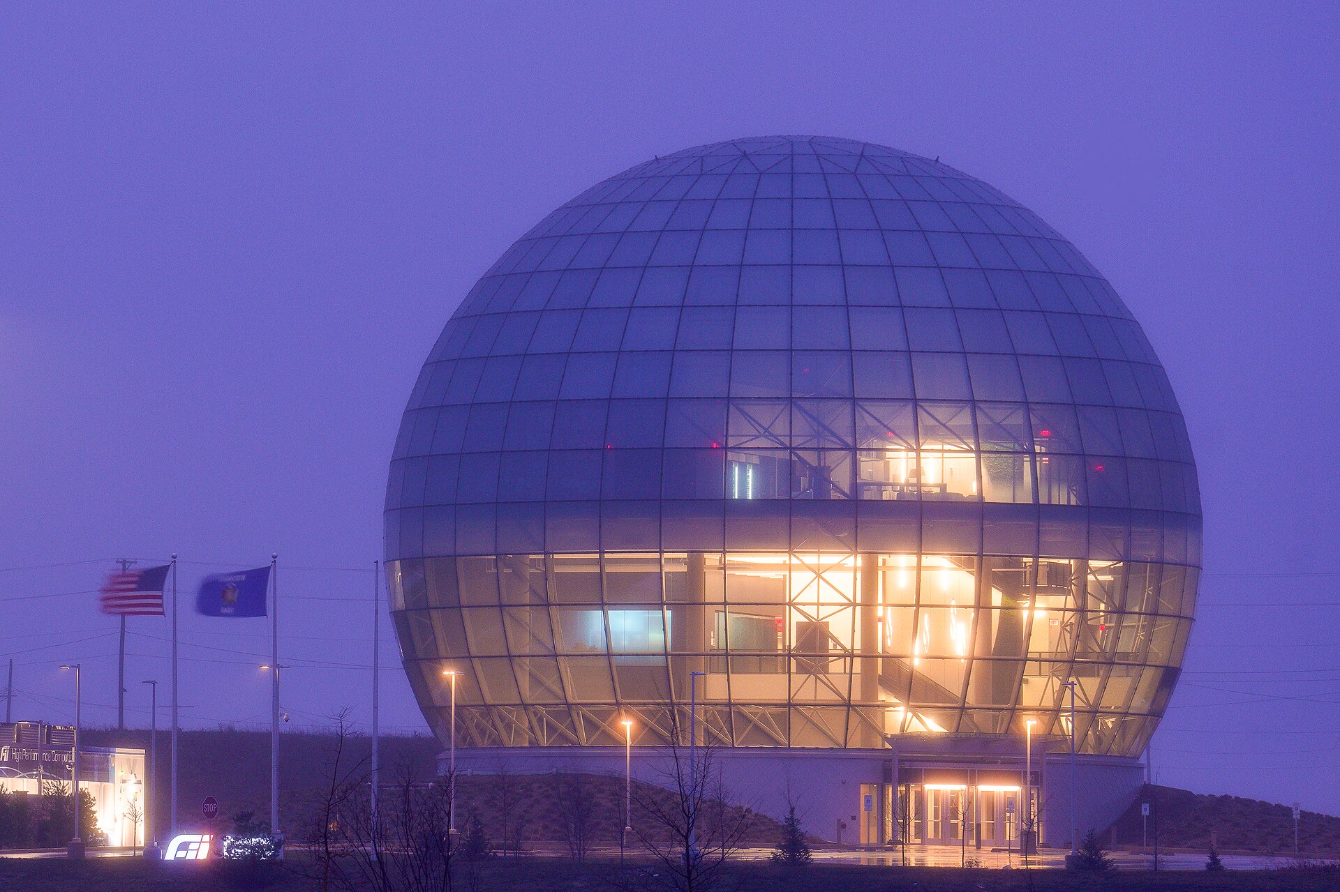 The glass dome of the Foxconn data center on the Mount Pleasant, Wisconsin campus, lit at dusk