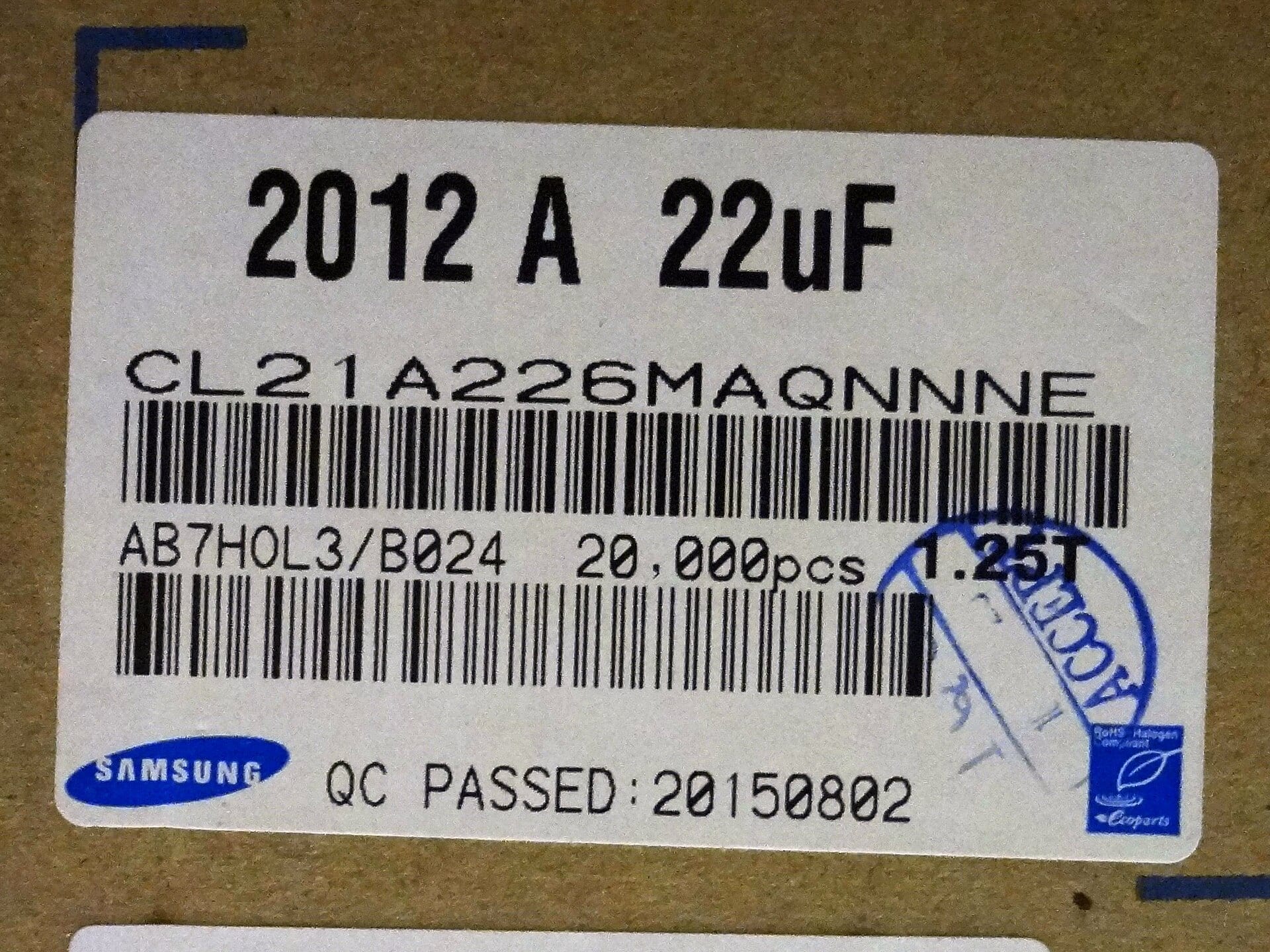 Shipping label on a box of 20,000 Samsung Electro-Mechanics multilayer ceramic capacitors