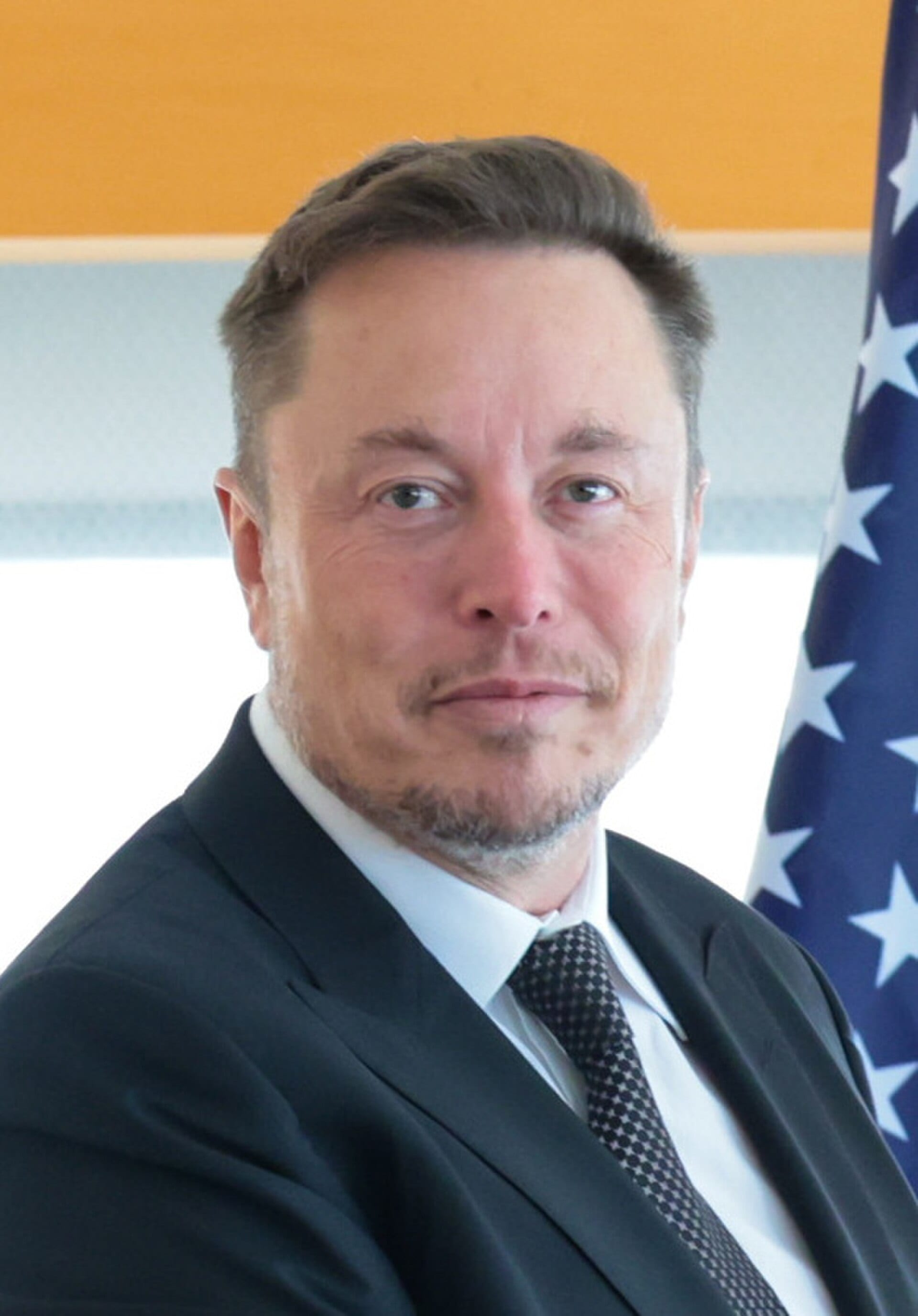 Elon Musk in 2023, in a close portrait at a meeting in New York