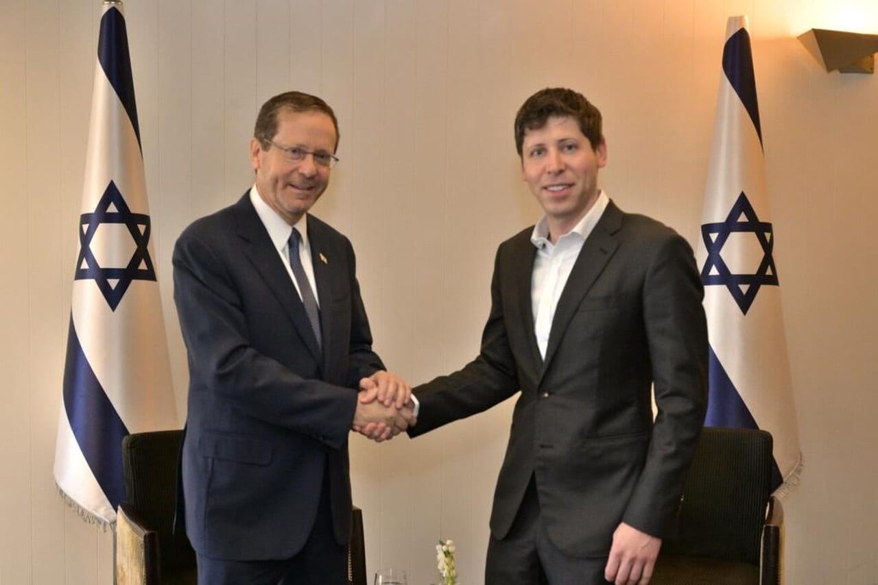 OpenAI chief executive Sam Altman, right, shakes hands with Israel's President Isaac Herzog in Jerusalem in June 2023
