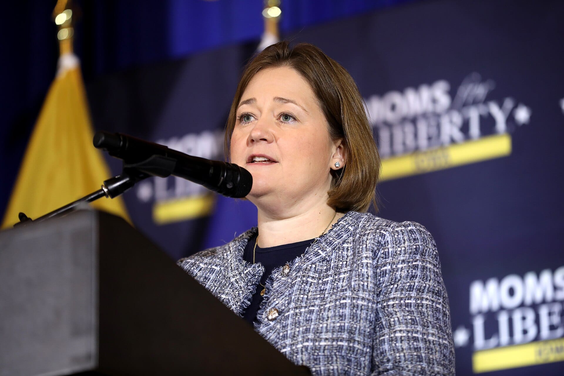 Iowa Attorney General Brenna Bird speaks at a podium