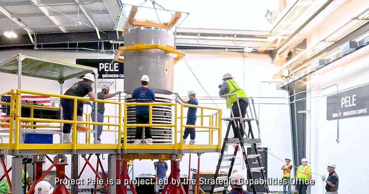 Workers assemble the Project Pele microreactor core barrel at BWXT