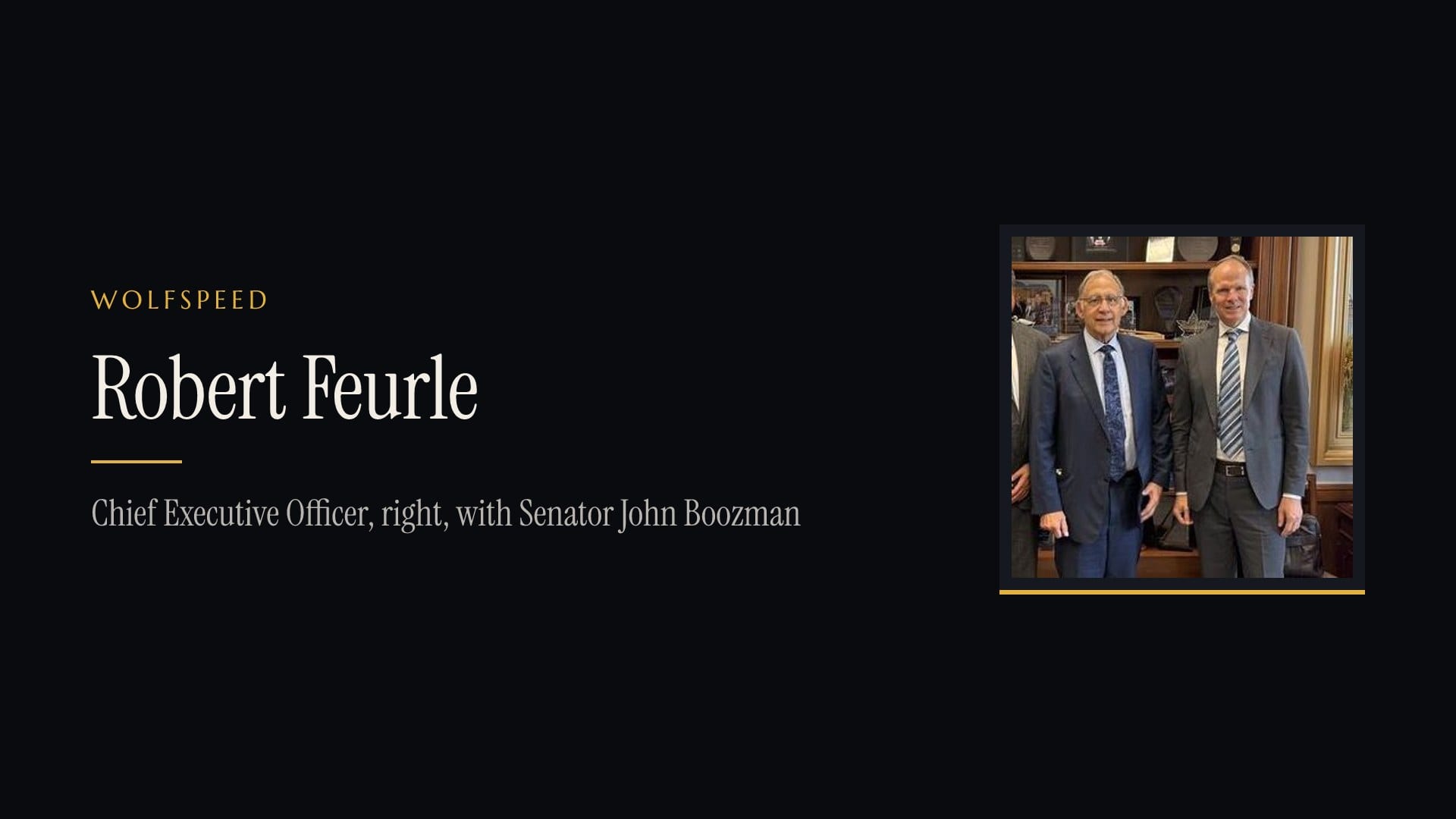 Wolfspeed chief executive Robert Feurle, right, with Senator John Boozman in the senator's Washington office