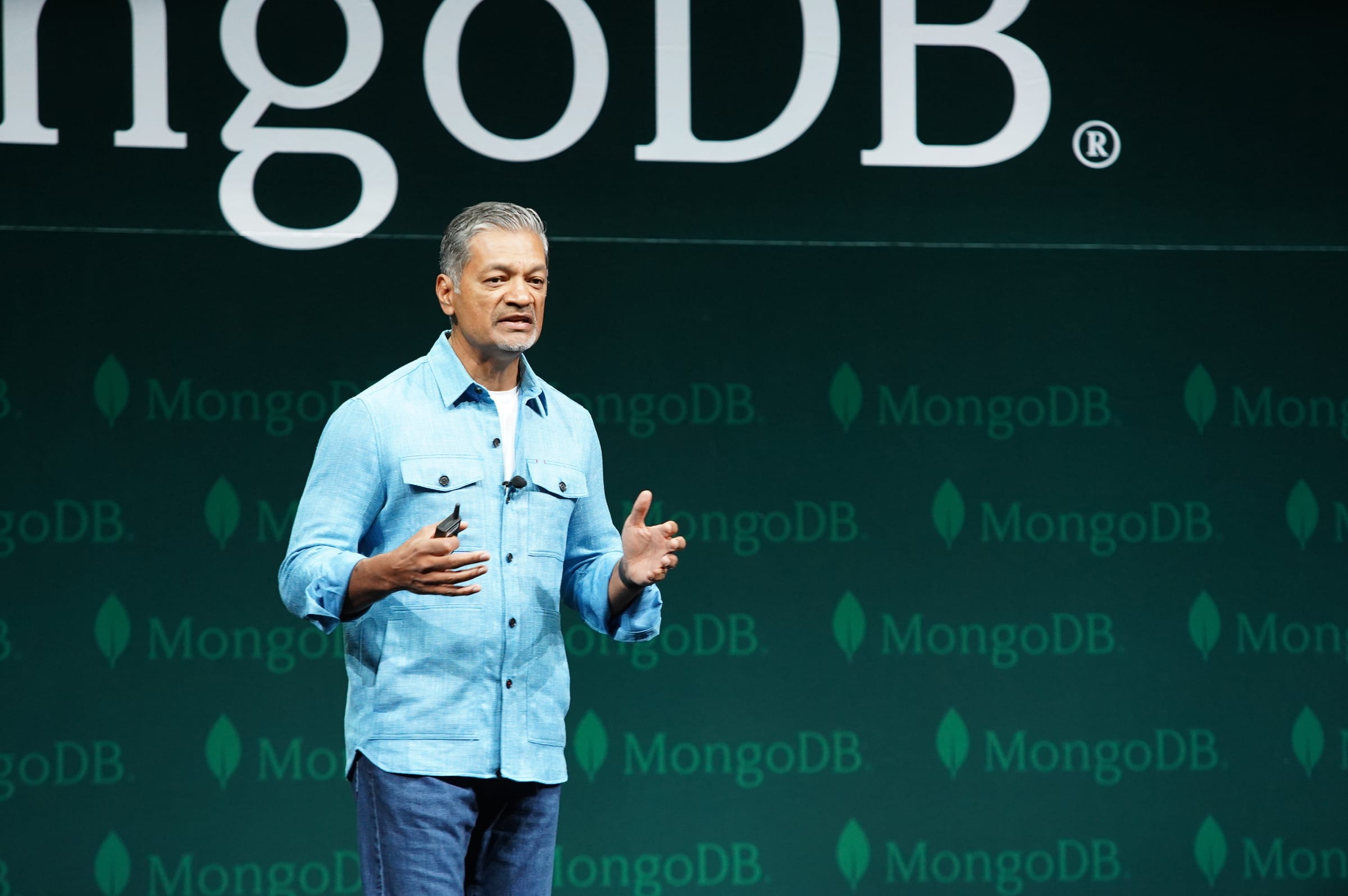 Dev Ittycheria speaking on stage at a MongoDB.local keynote