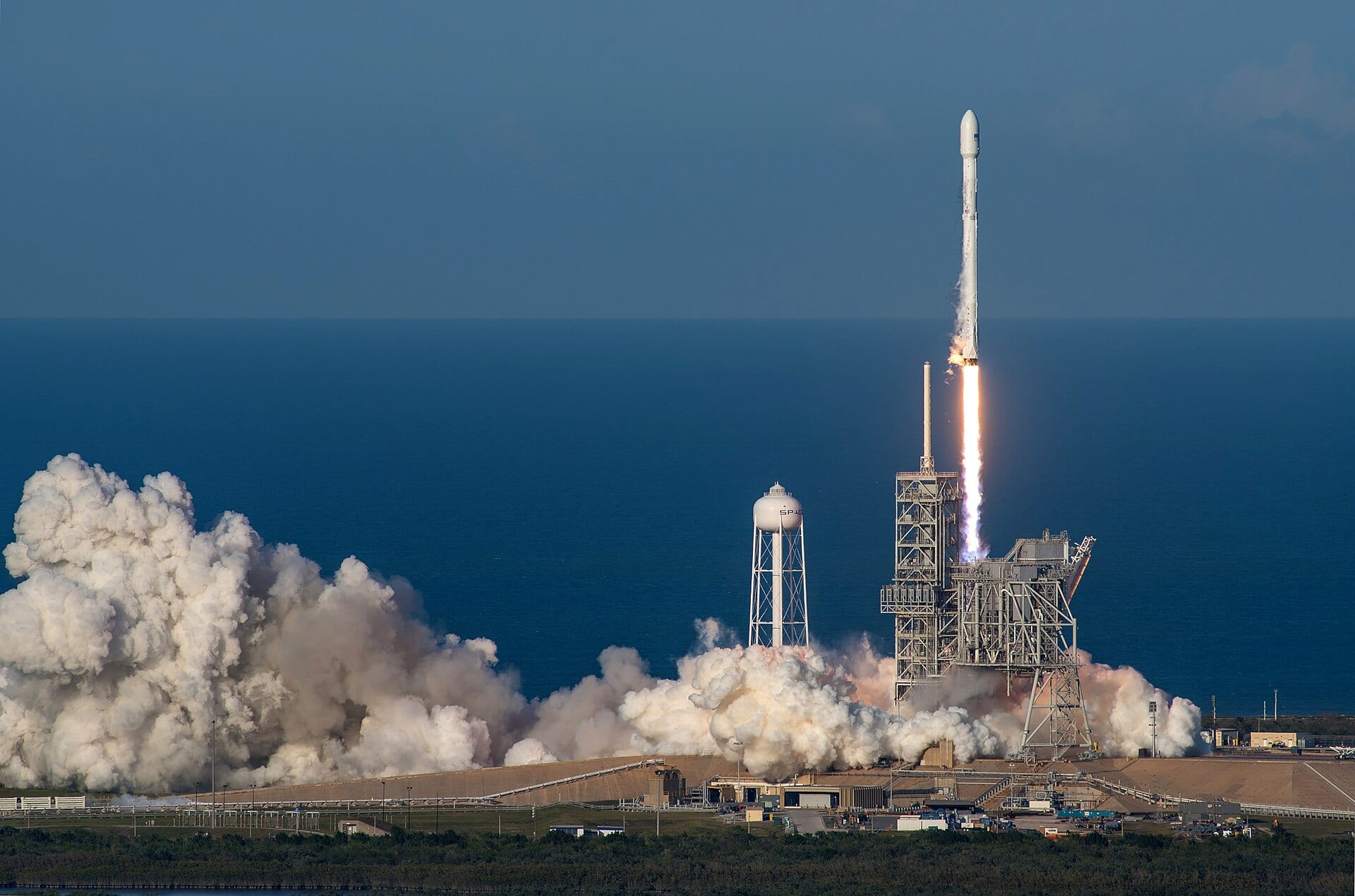 A SpaceX Falcon 9 rocket lifts off from Kennedy Space Center