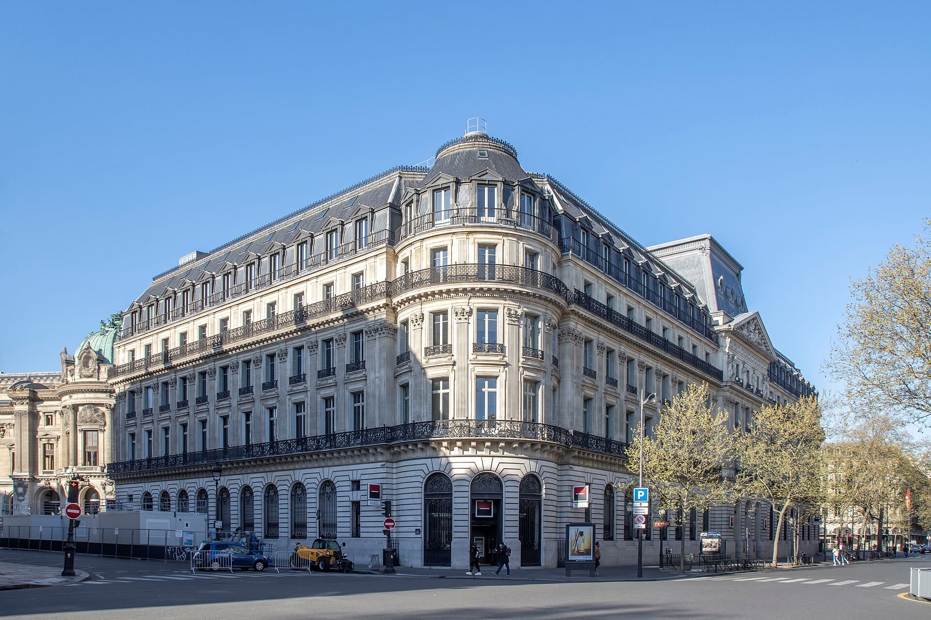 Societe Generale's historic head office at 29 boulevard Haussmann in Paris, the bank's red and black logo on the facade